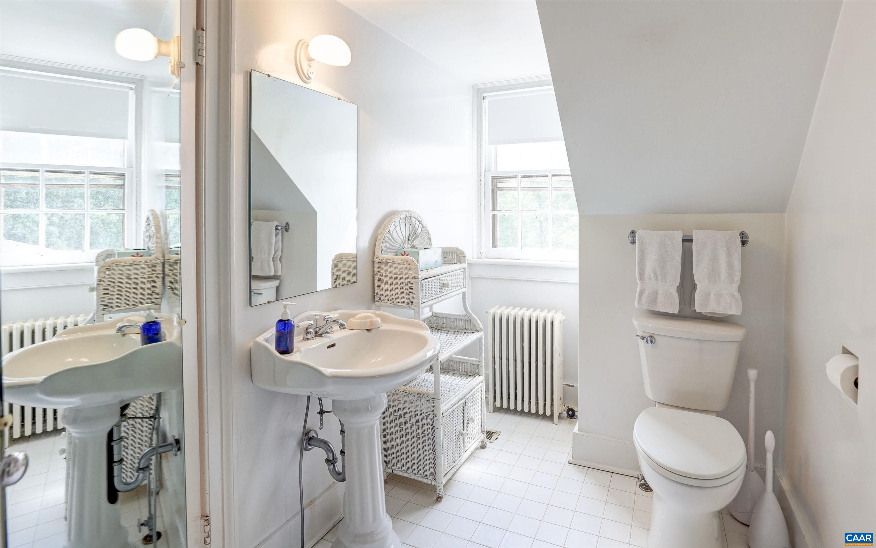 2051 Polo Grounds Road Charlottesville, VA 22911 - Photo 25 of 74 a bathroom with a sink toilet and a mirror