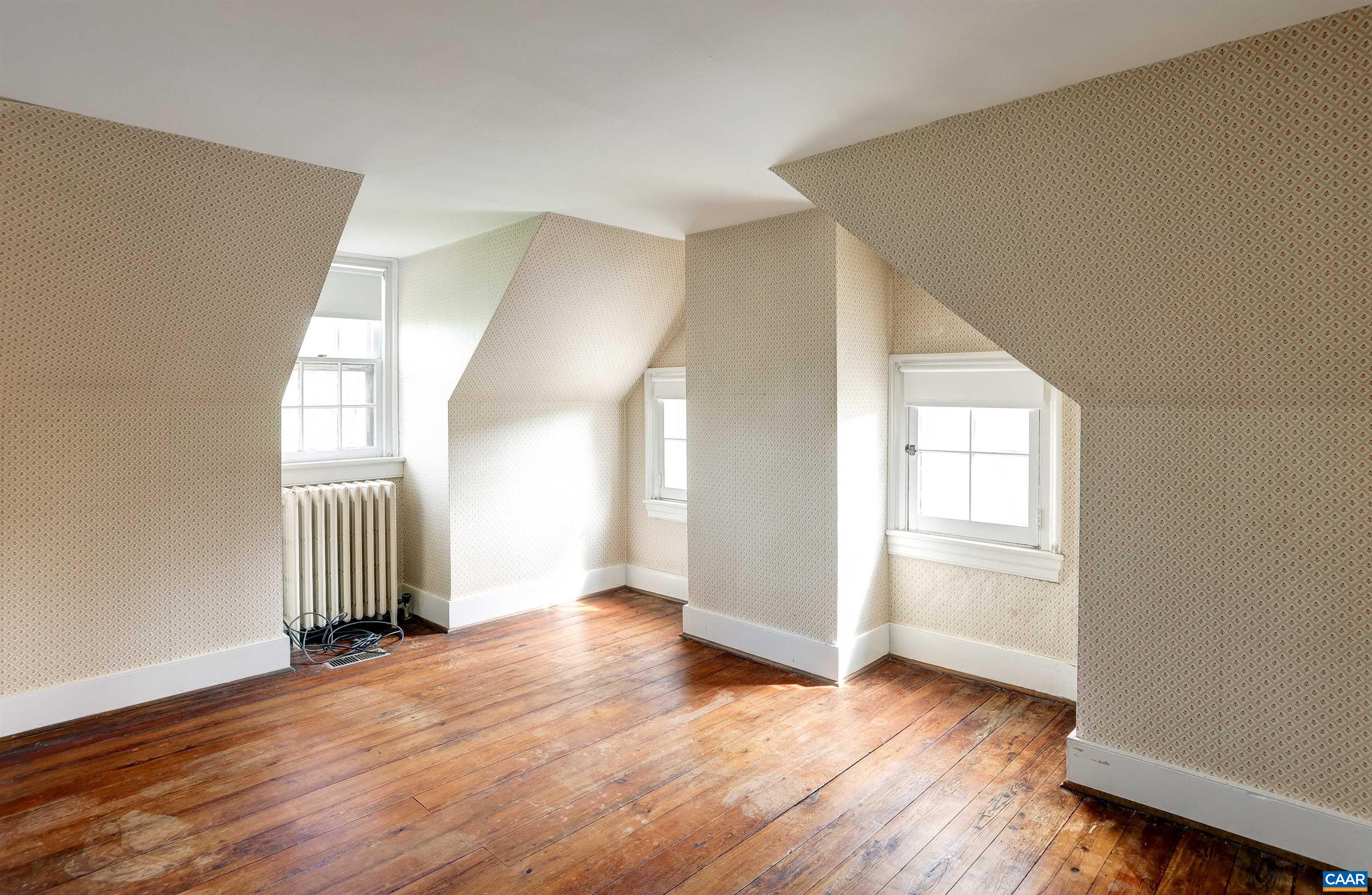 2051 Polo Grounds Road Charlottesville, VA 22911 - Photo 33 of 74 an empty room with wooden floor and windows