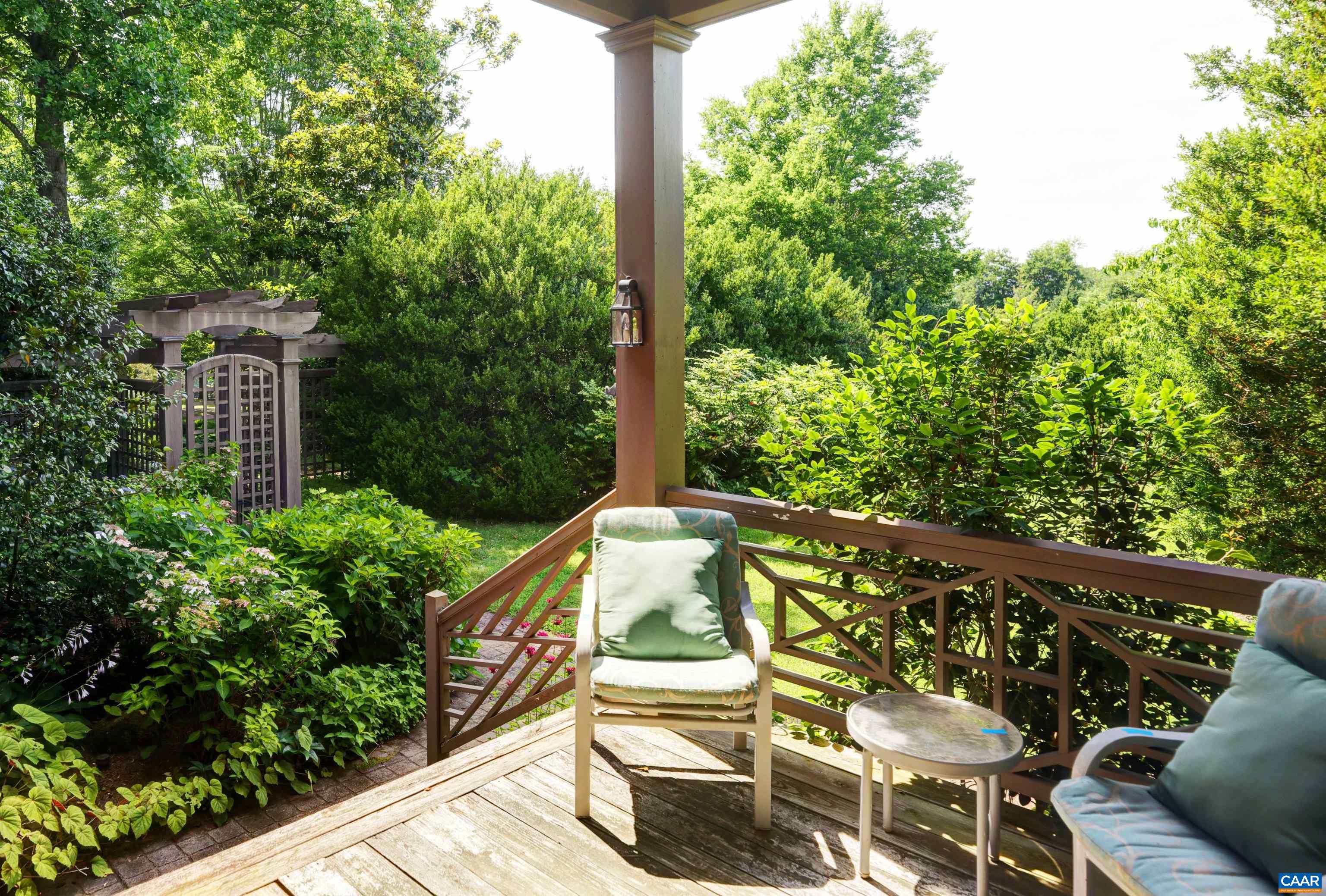 2051 Polo Grounds Road Charlottesville, VA 22911 - Photo 40 of 74 a view of a chair and tables in the balcony