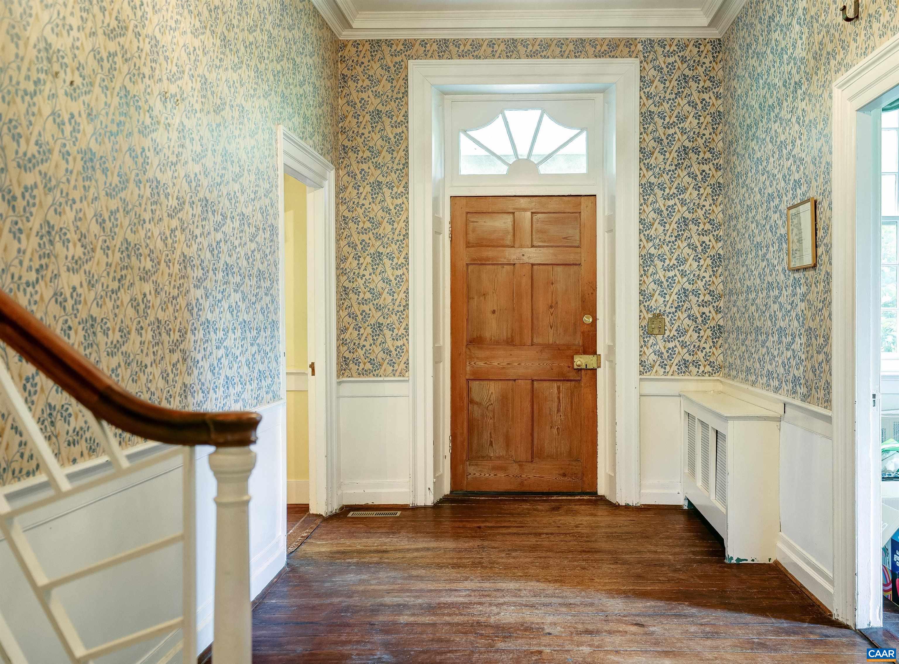 2051 Polo Grounds Road Charlottesville, VA 22911 - Photo 4 of 74 a view of empty room with wooden floor and fan
