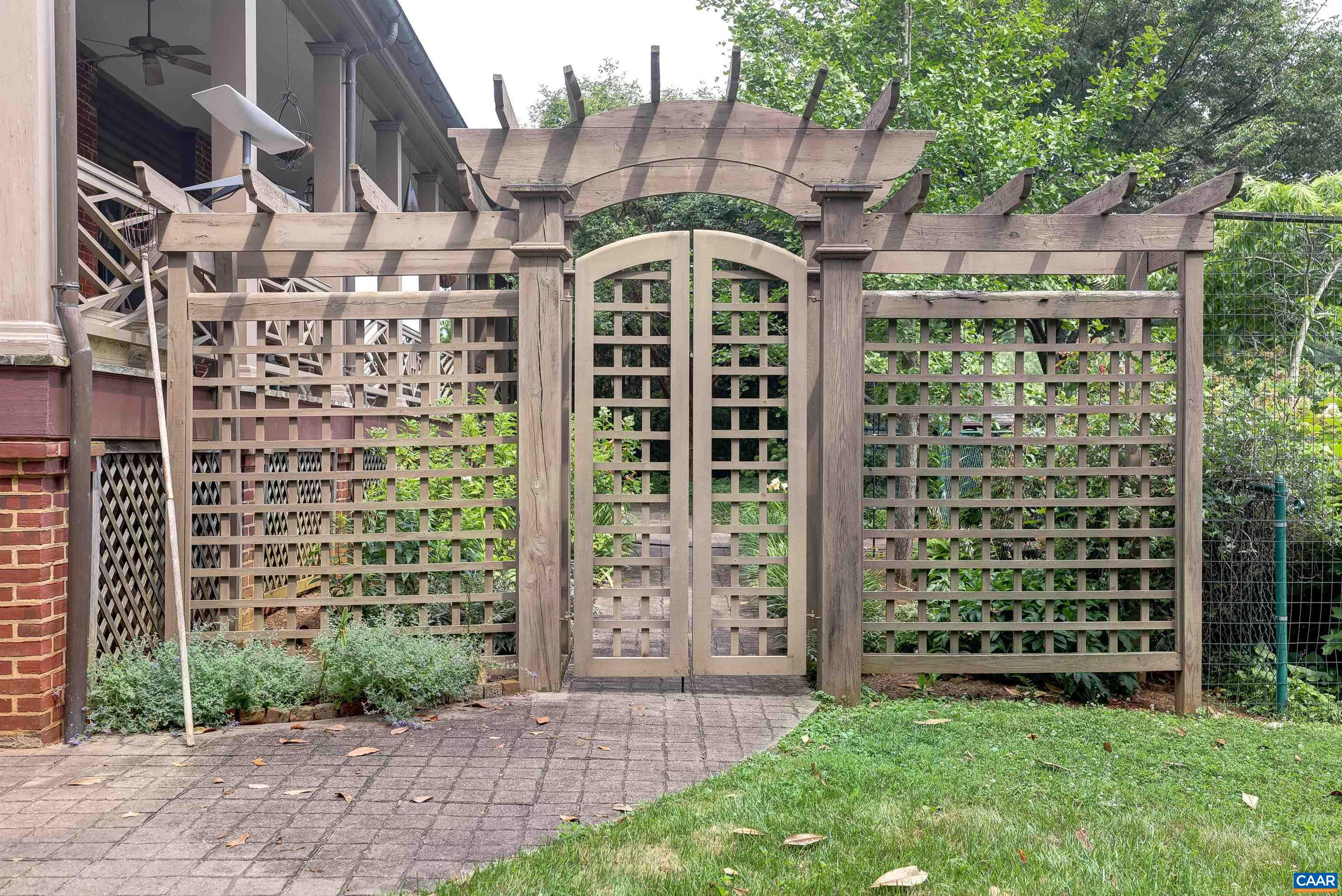 2051 Polo Grounds Road Charlottesville, VA 22911 - Photo 46 of 74 a front view of a building with garden