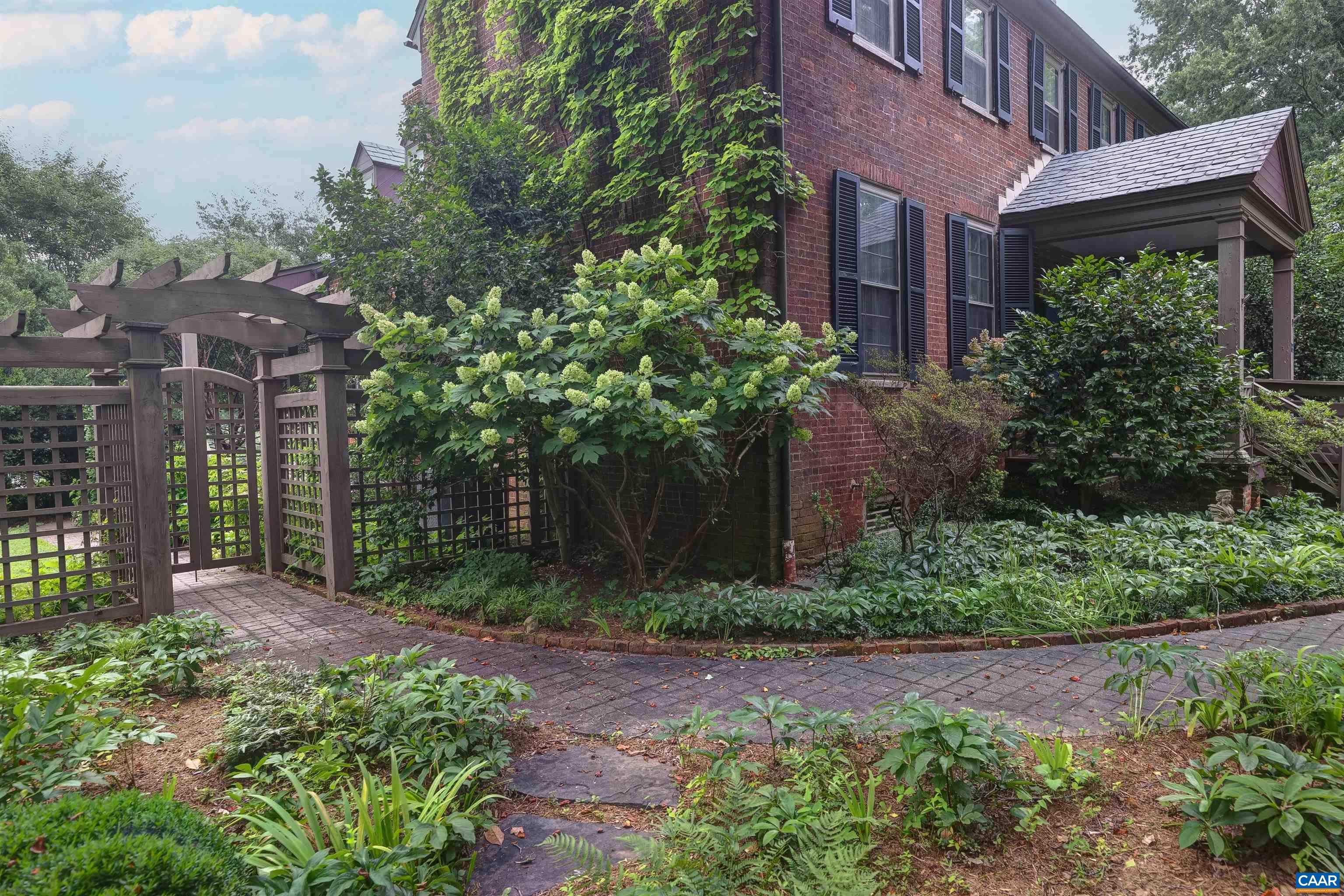 2051 Polo Grounds Road Charlottesville, VA 22911 - Photo 48 of 74 a view of a house with a yard and plants