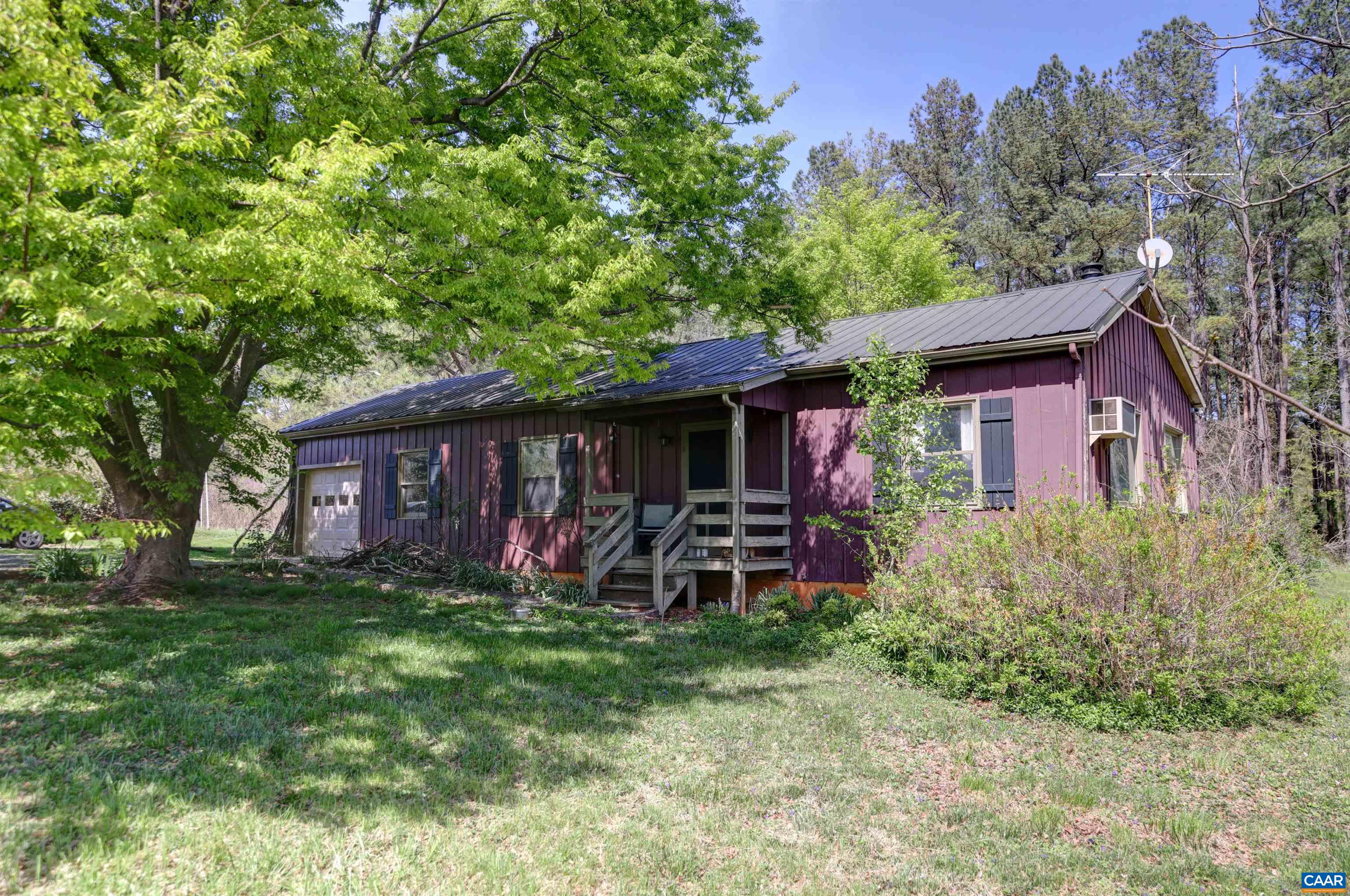 2051 Polo Grounds Road Charlottesville, VA 22911 - Photo 58 of 74 a view of a house with a yard porch and sitting area