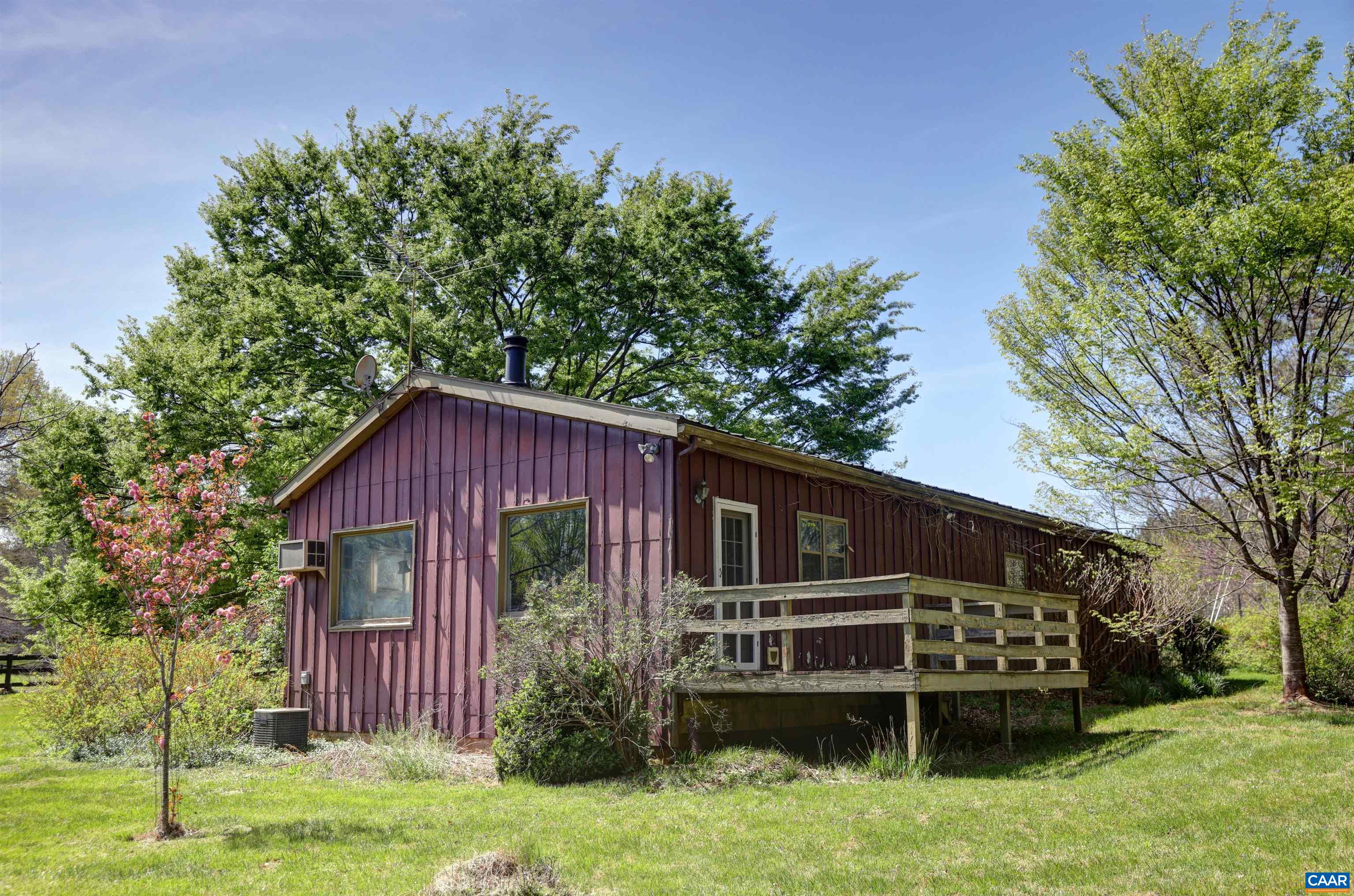 2051 Polo Grounds Road Charlottesville, VA 22911 - Photo 59 of 74 a view of a small house with yard and trampoline