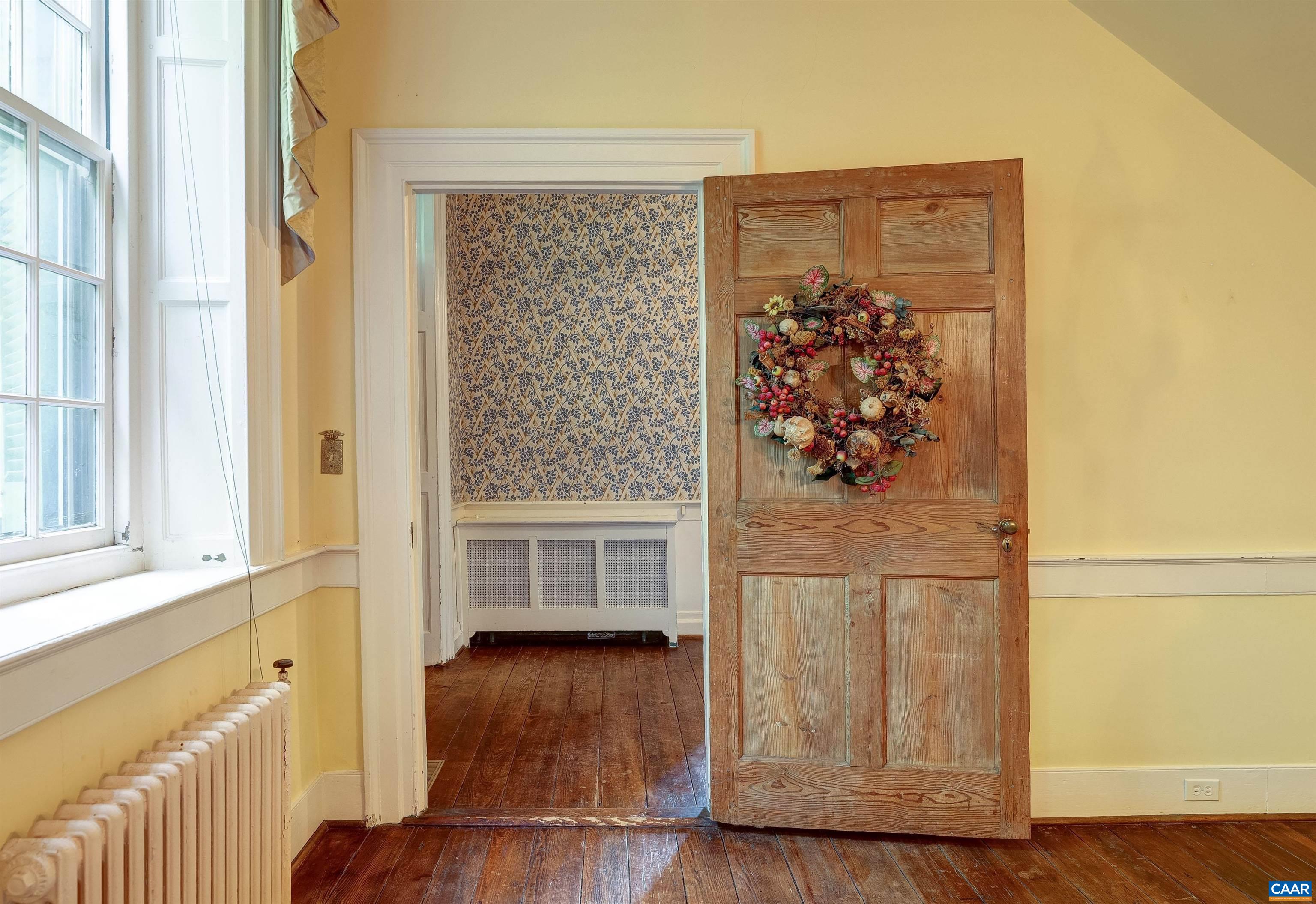 2051 Polo Grounds Road Charlottesville, VA 22911 - Photo 7 of 74 a view of front door with wooden floor