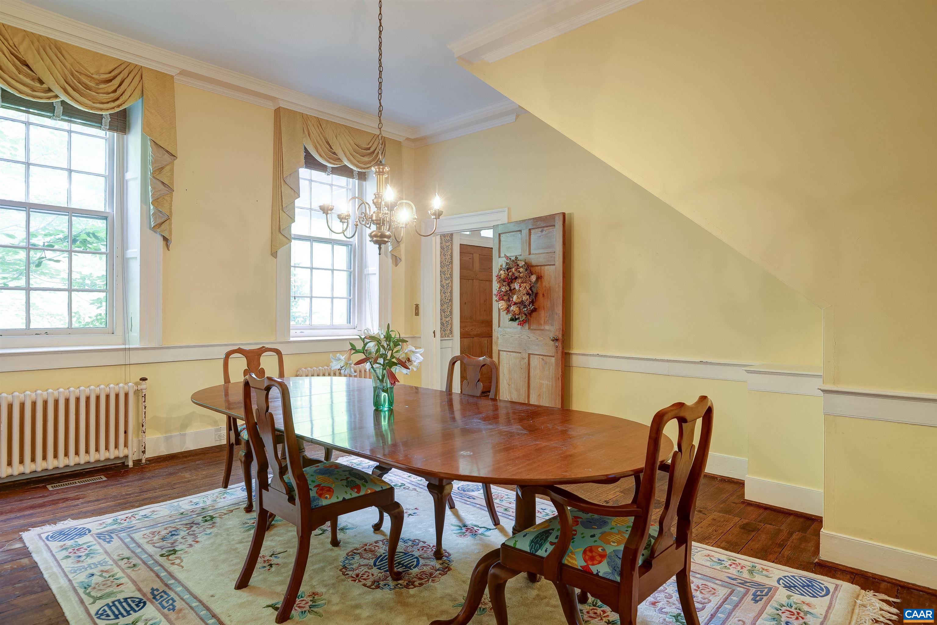 2051 Polo Grounds Road Charlottesville, VA 22911 - Photo 8 of 74 a view of a dining room with furniture and window