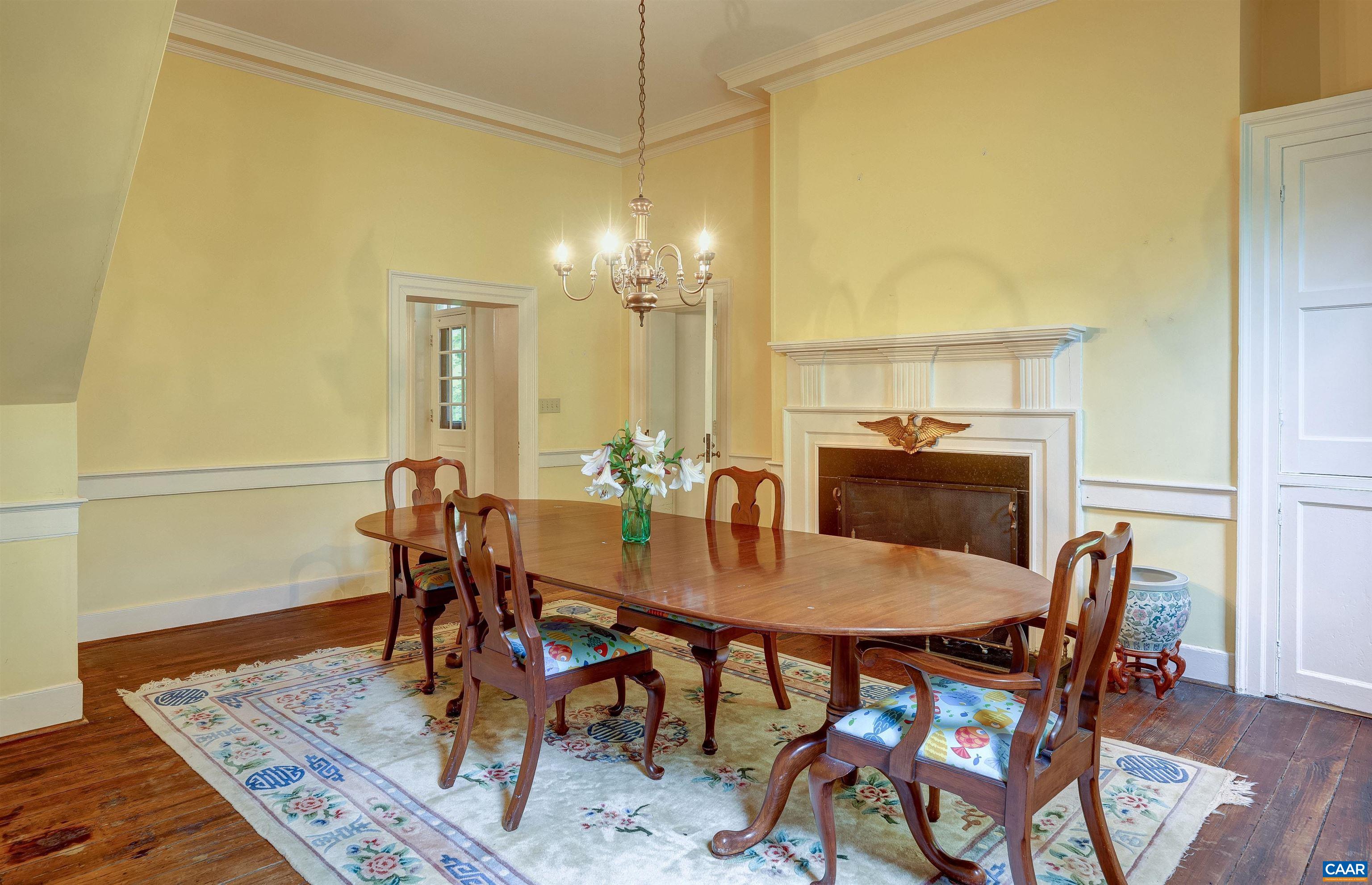 2051 Polo Grounds Road Charlottesville, VA 22911 - Photo 9 of 74 a view of a dining room with furniture and wooden floor