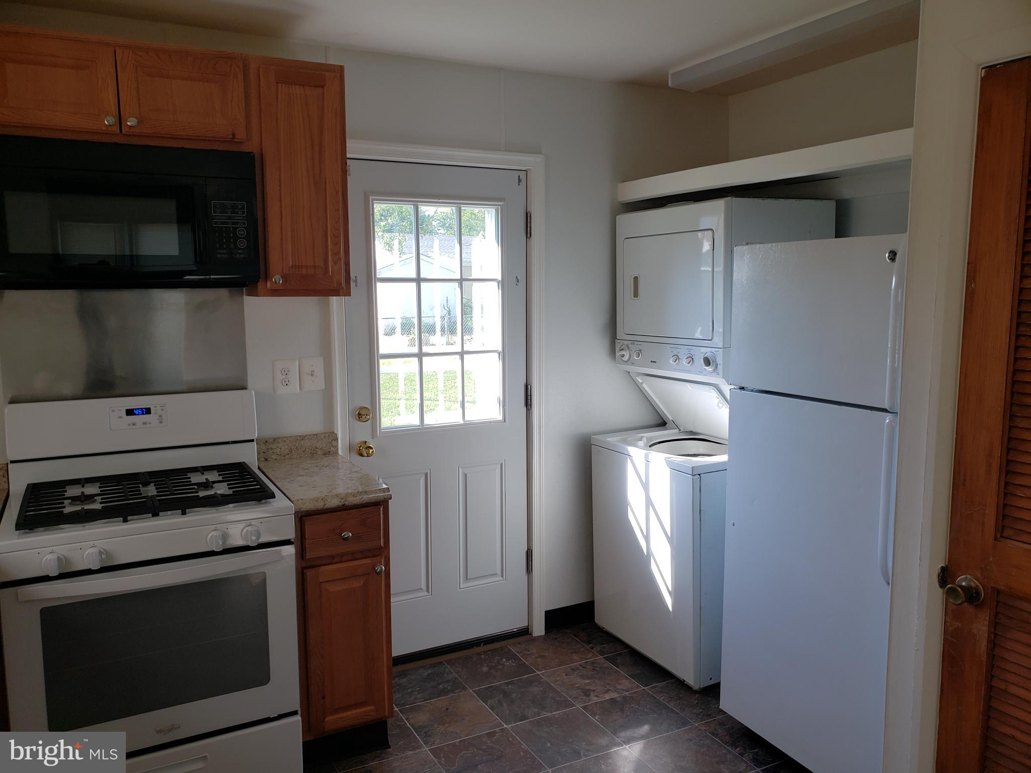 322 Baltimore Street Aberdeen, MD 21001 - Photo 11 of 19 Kitchen w/entrance to rear fenced yard