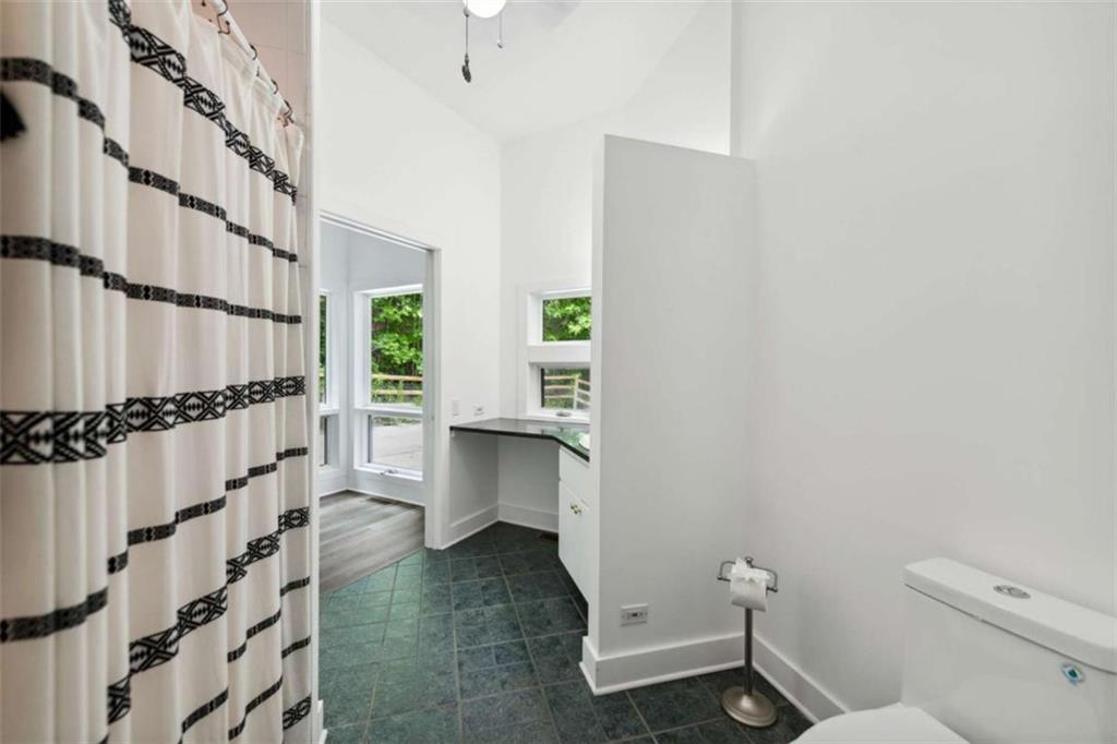 10323 Old CCC Camp Road Chatsworth, GA 30705 - Photo 65 of 97 a bathroom with a sink and a mirror