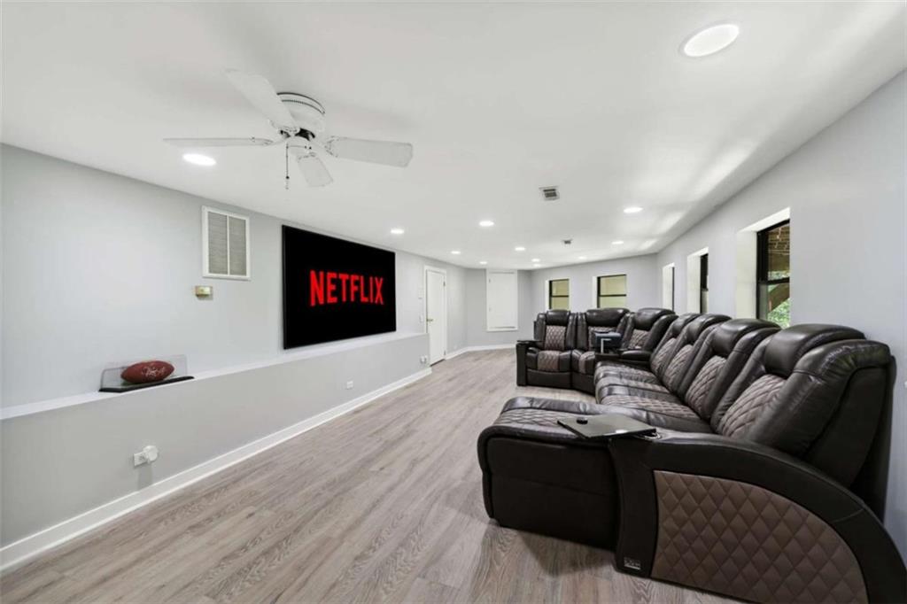 10323 Old CCC Camp Road Chatsworth, GA 30705 - Photo 68 of 97 a living room with furniture and a flat screen tv