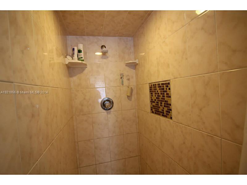 5301 Southwest 196th Lane Southwest Ranches, FL 33332 - Photo 8 of 35 a bathroom with a shower