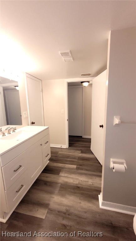 2830 North Lake Damon Road, Unit A Avon Park, FL 33825 - Photo 15 of 20 a bathroom with a sink double vanity and a mirror