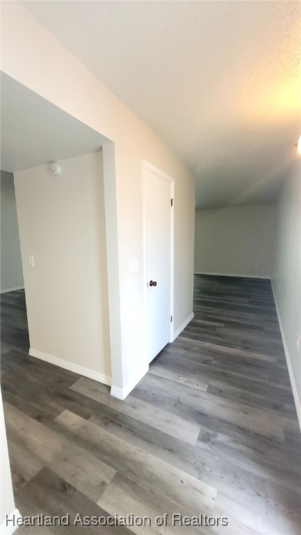 2830 North Lake Damon Road, Unit A Avon Park, FL 33825 - Photo 18 of 20 a view of a hallway with wooden floor
