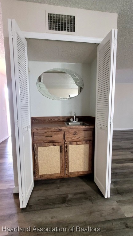 2830 North Lake Damon Road, Unit A Avon Park, FL 33825 - Photo 5 of 20 a kitchen with a stove and a microwave