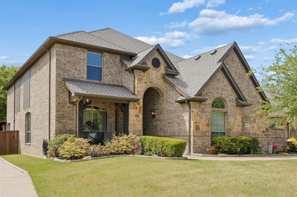 8104 Red Riv Run North Richland Hills, TX 76180 - Photo 1 of 38 a front view of a house with a yard