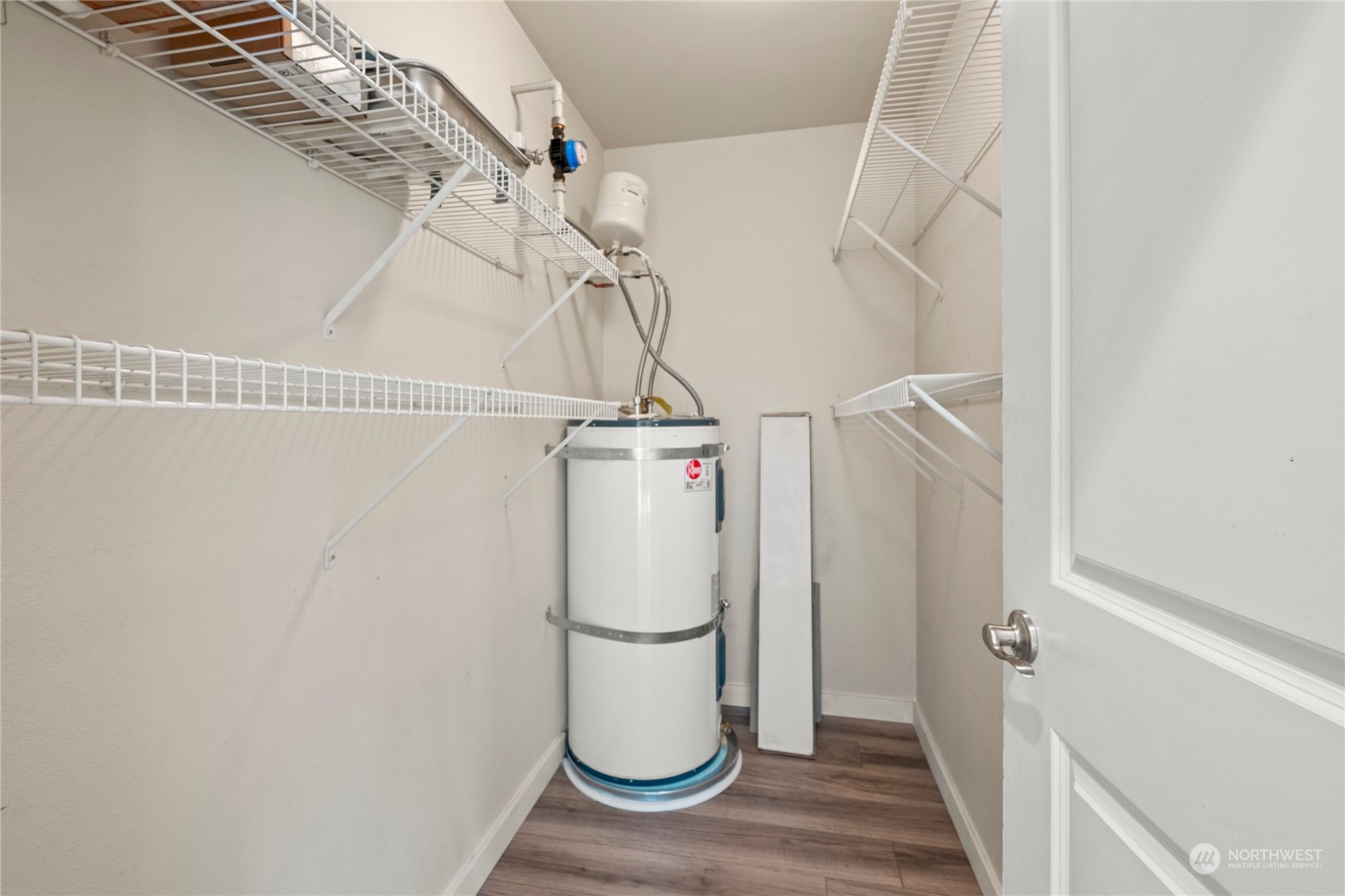3914 243rd Place Southeast, Unit L203 Bothell, WA 98021 - Photo 23 of 32 a utility room with a shower
