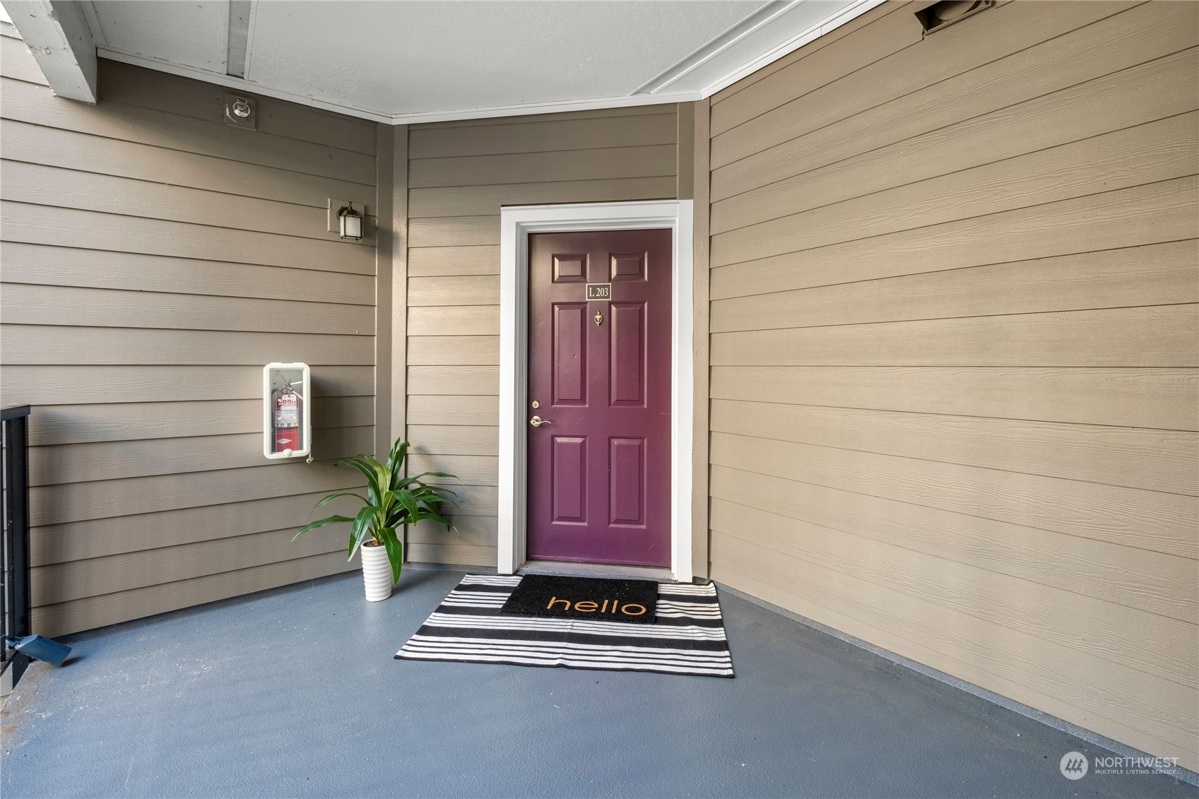 3914 243rd Place Southeast, Unit L203 Bothell, WA 98021 - Photo 3 of 32 a view of outdoor space and garage