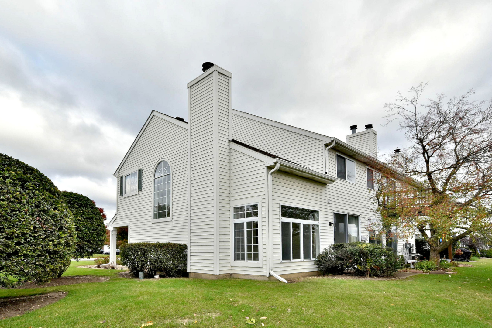 8343 Ripple Ridge Darien, IL 60561 - Photo 2 of 32 a view of a house with a garden