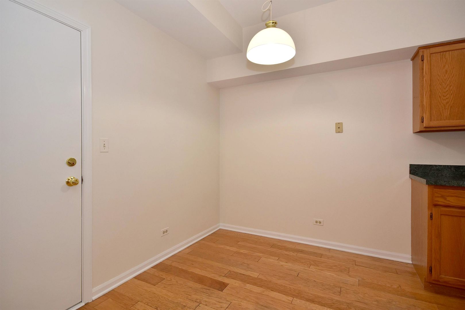 8343 Ripple Ridge Darien, IL 60561 - Photo 15 of 32 a view of a small space with wooden floor and a window