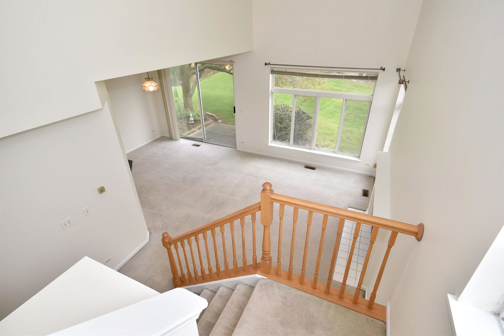 8343 Ripple Ridge Darien, IL 60561 - Photo 16 of 32 a view of a bedroom with wooden floor and windows