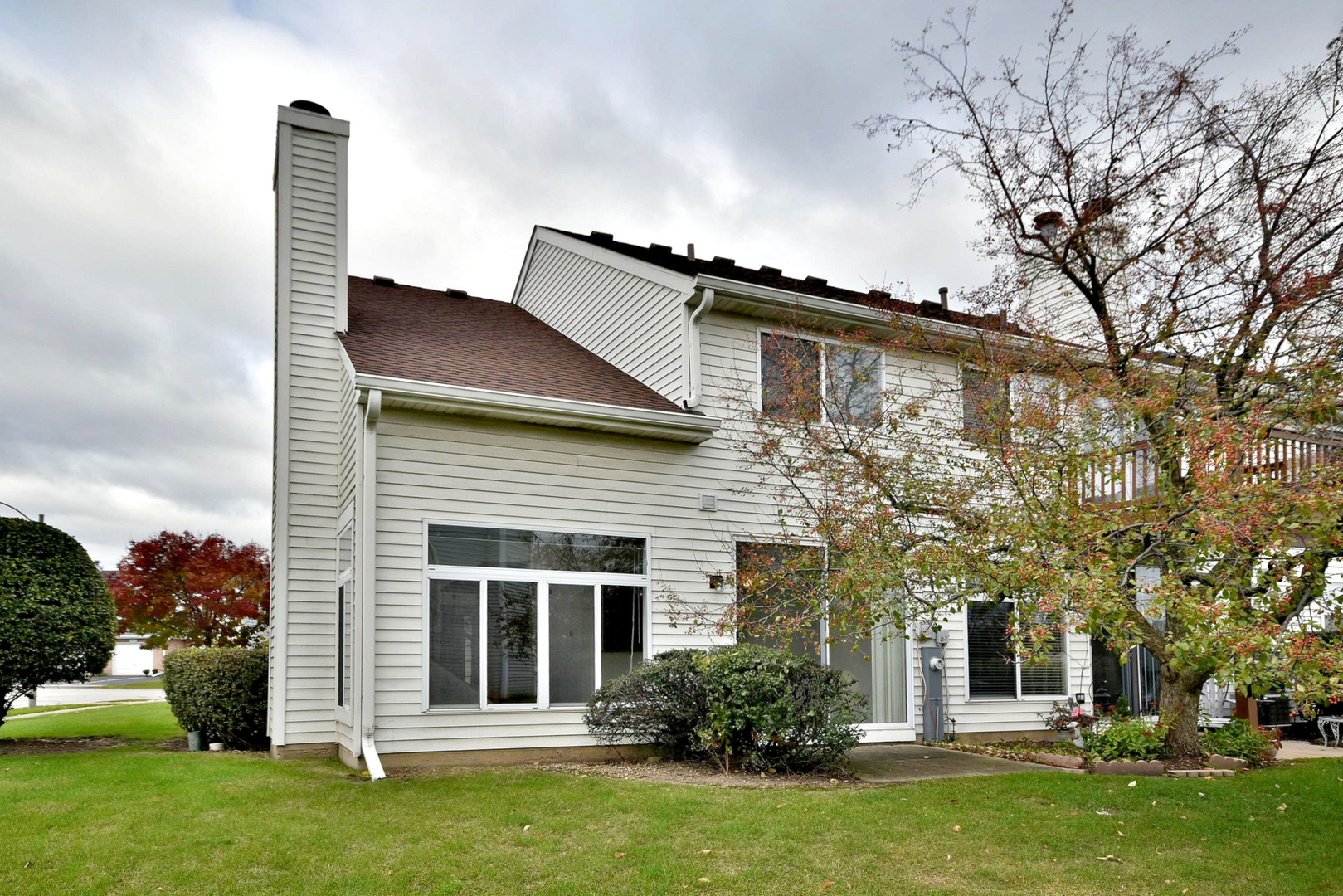 8343 Ripple Ridge Darien, IL 60561 - Photo 3 of 32 a front view of a house with garden
