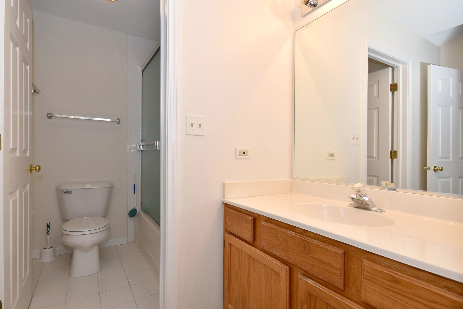 8343 Ripple Ridge Darien, IL 60561 - Photo 25 of 32 a bathroom with a sink toilet and shower