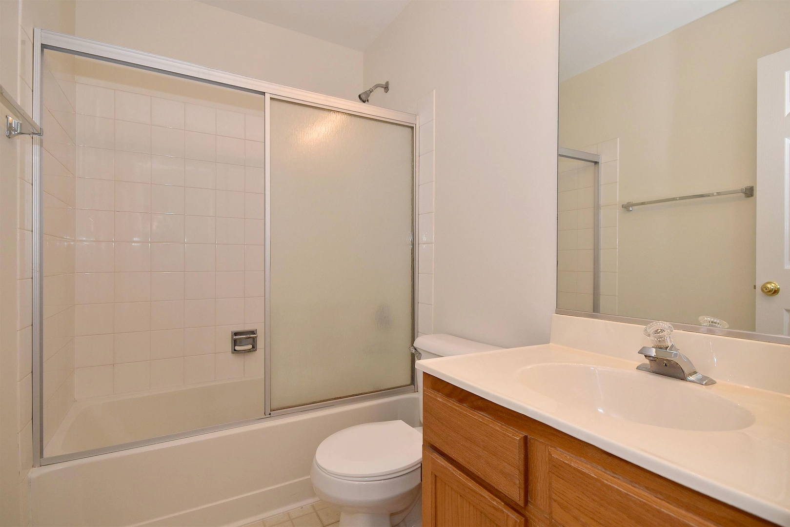 8343 Ripple Ridge Darien, IL 60561 - Photo 27 of 32 a bathroom with a sink a toilet and shower