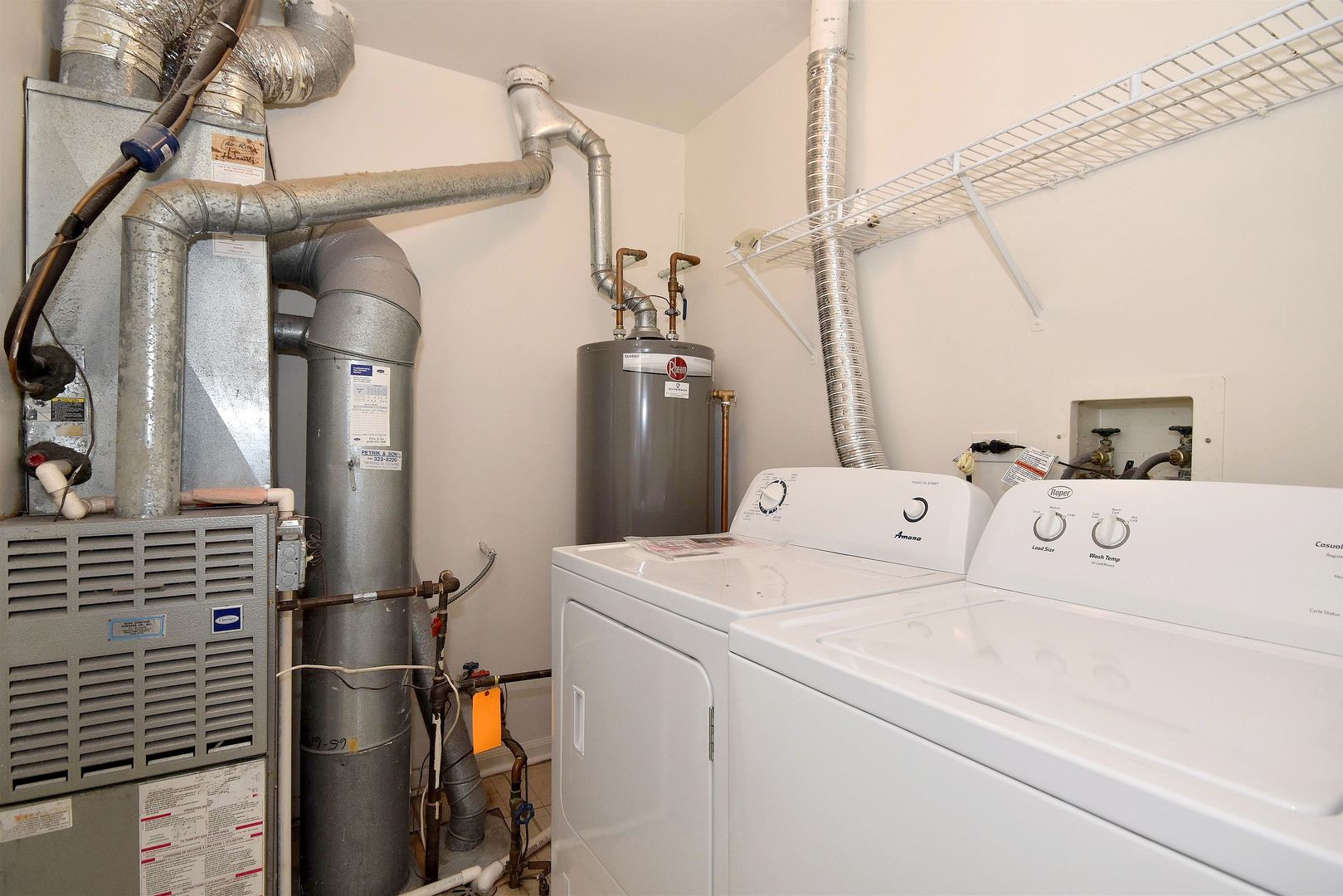 8343 Ripple Ridge Darien, IL 60561 - Photo 32 of 32 a utility room with dryer and washer