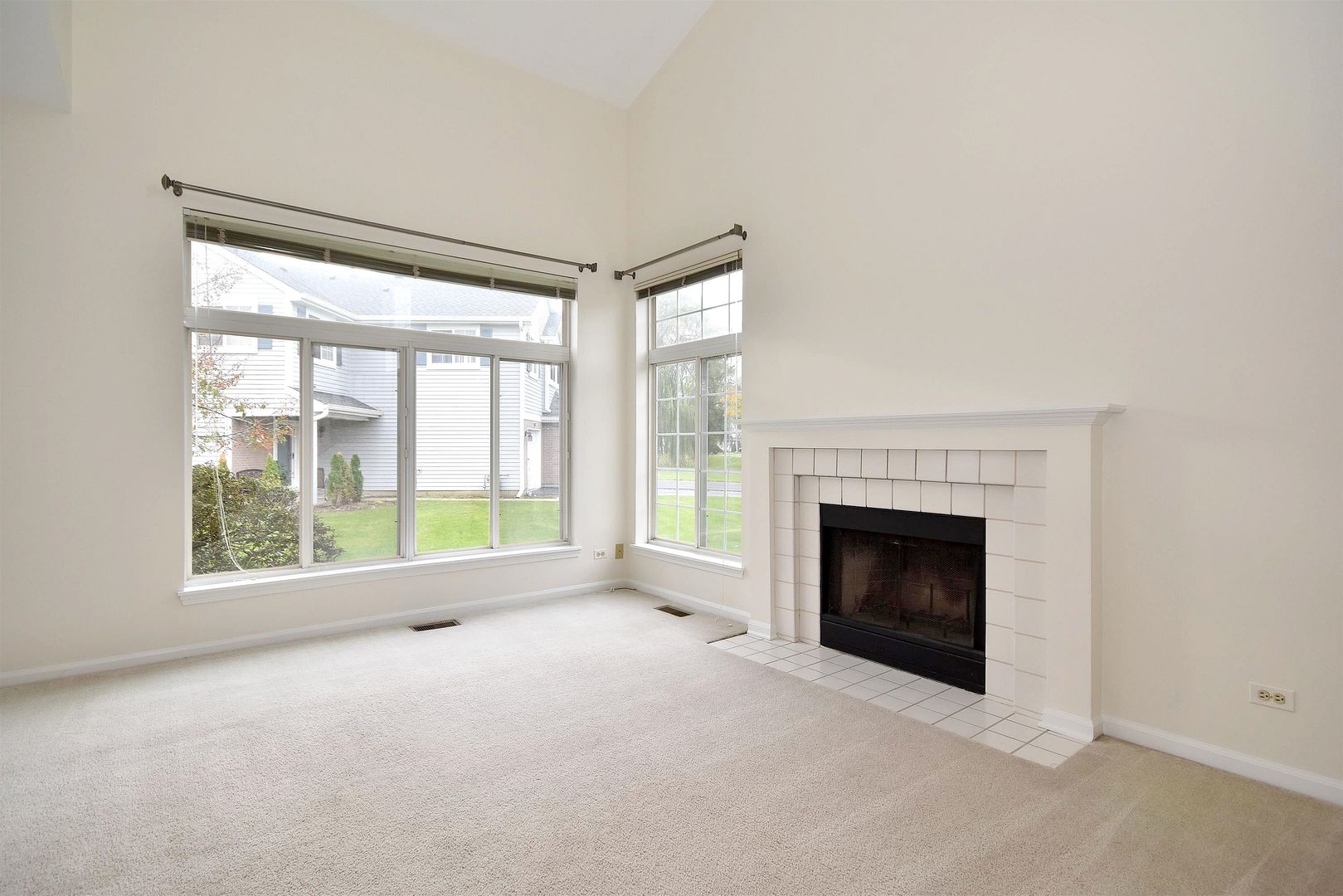 8343 Ripple Ridge Darien, IL 60561 - Photo 6 of 32 a view of an empty room with window and fire place