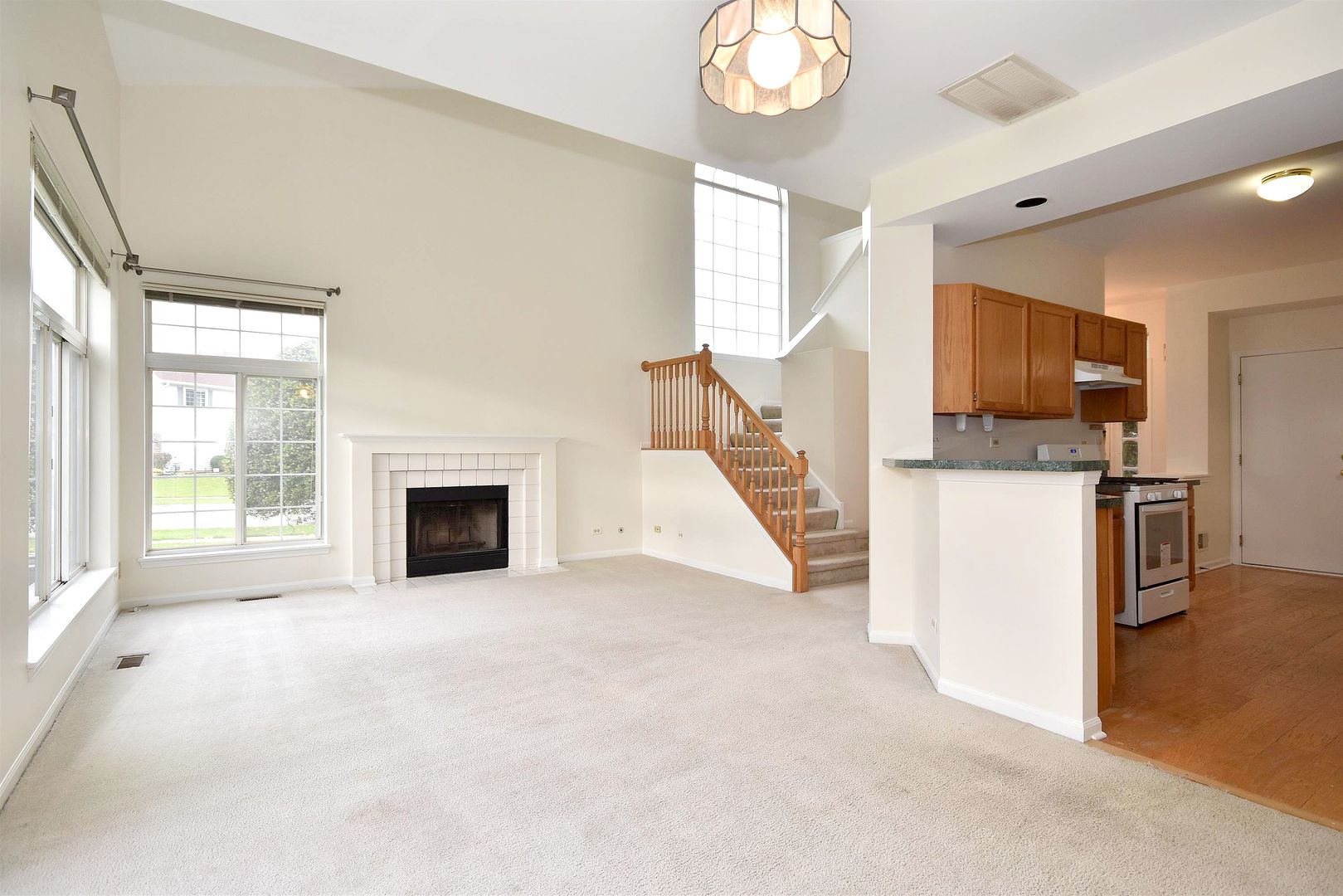 8343 Ripple Ridge Darien, IL 60561 - Photo 9 of 32 a view of a kitchen with a sink dishwasher and a fireplace