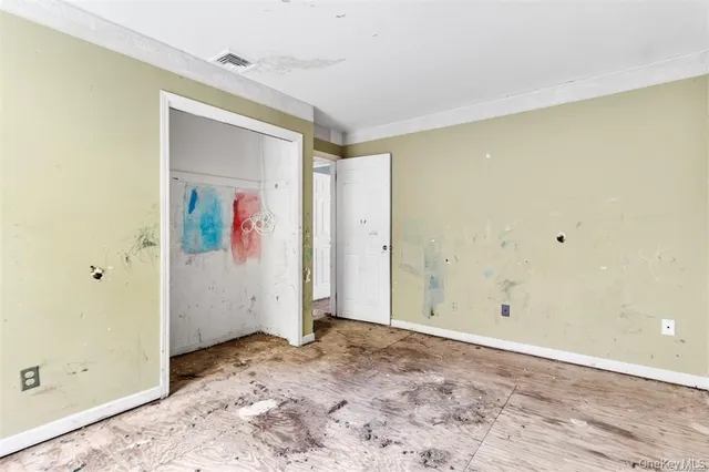 a bathroom with a sink toilet and a mirror