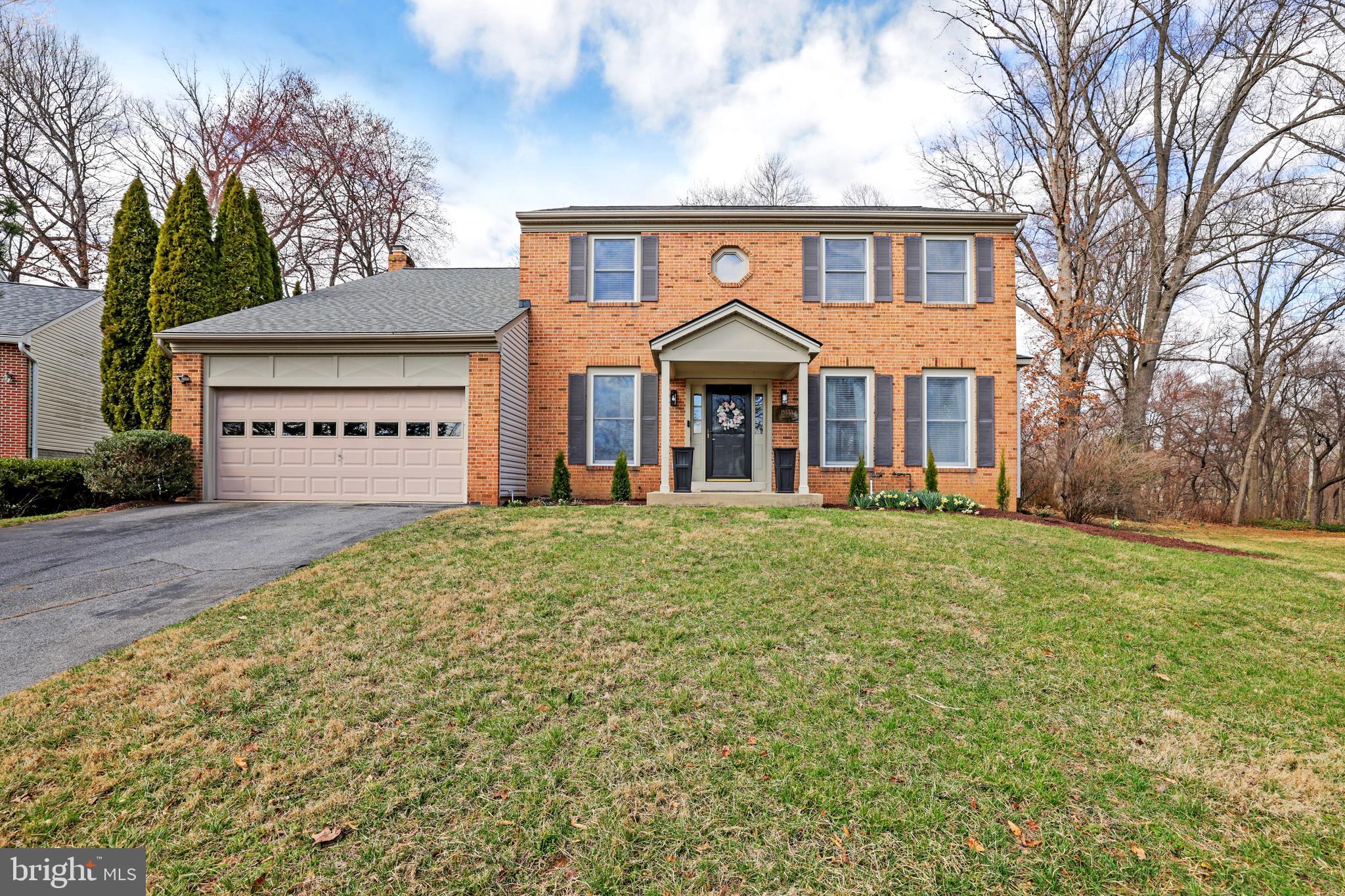 15532 Quince Ridge Lane North Potomac, MD 20878 - Photo 1 of 50 a front view of a house with a yard