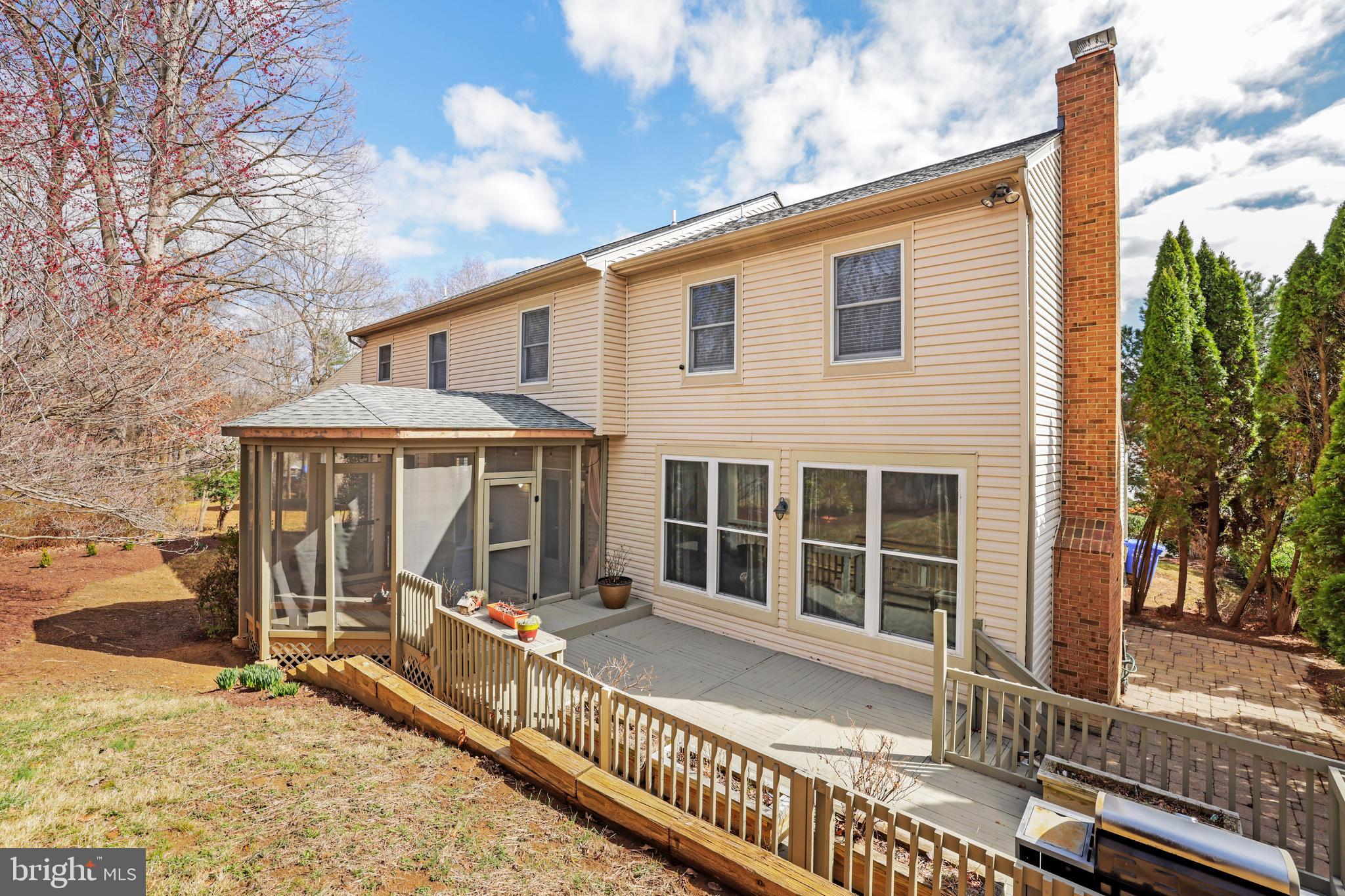 15532 Quince Ridge Lane North Potomac, MD 20878 - Photo 19 of 50 a view of a house with a wooden fence
