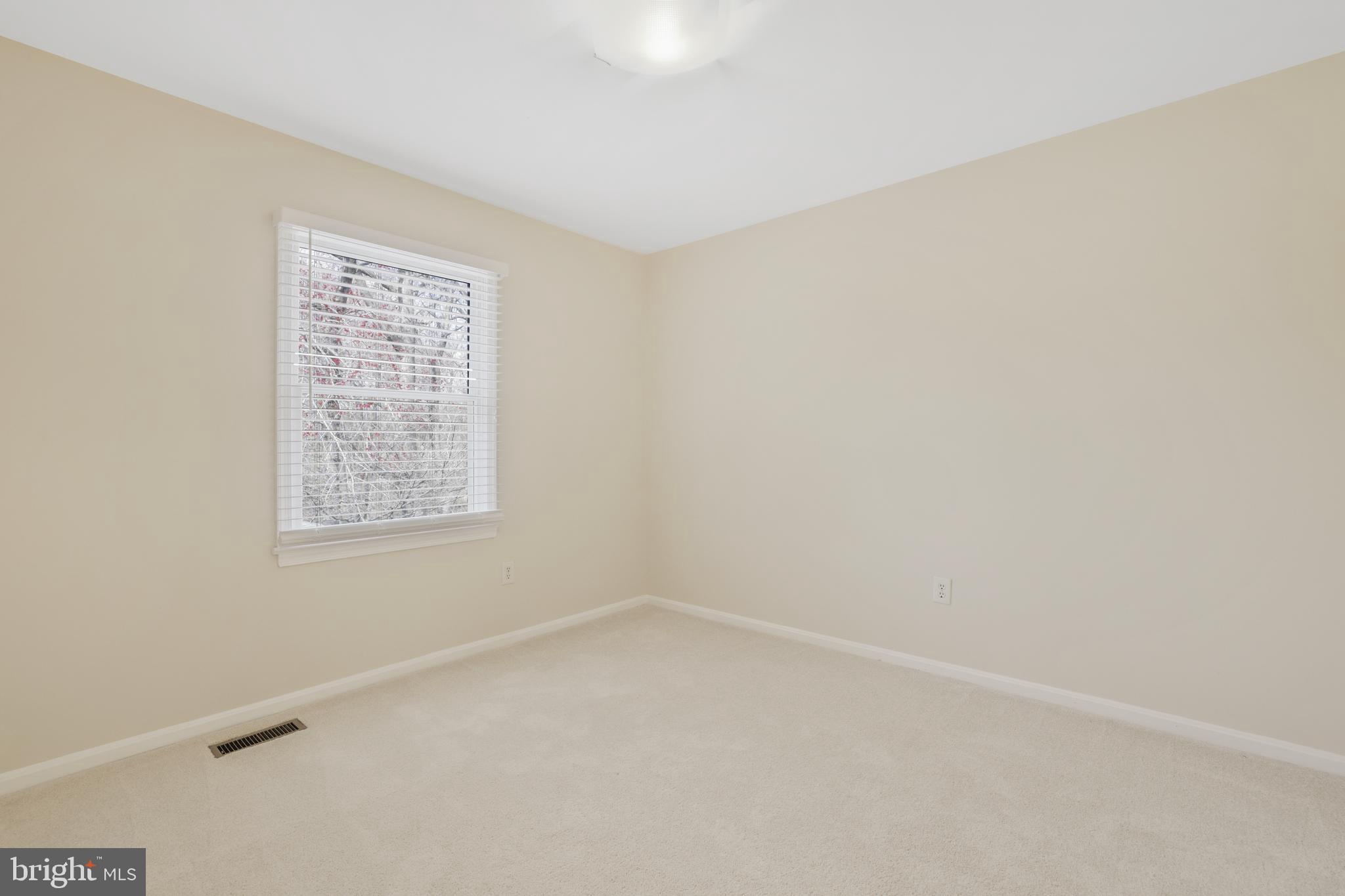 15532 Quince Ridge Lane North Potomac, MD 20878 - Photo 28 of 50 an empty room with a window