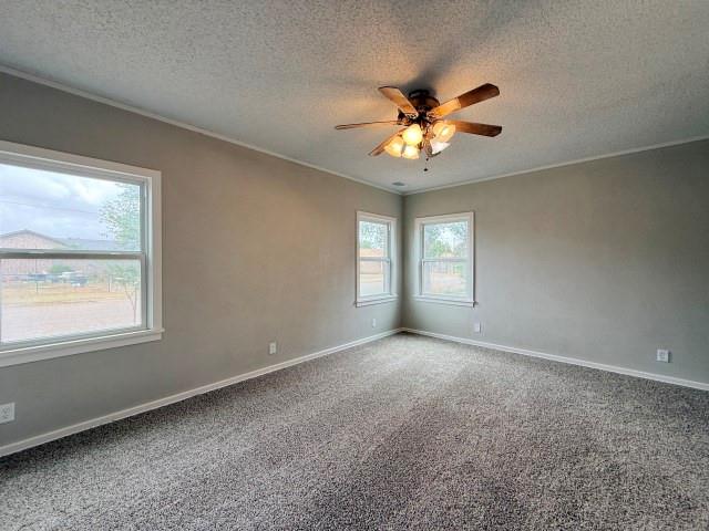 1001 North 3rd Street Lamesa, TX 79331 - Photo 28 of 32 a view of an empty room with a window
