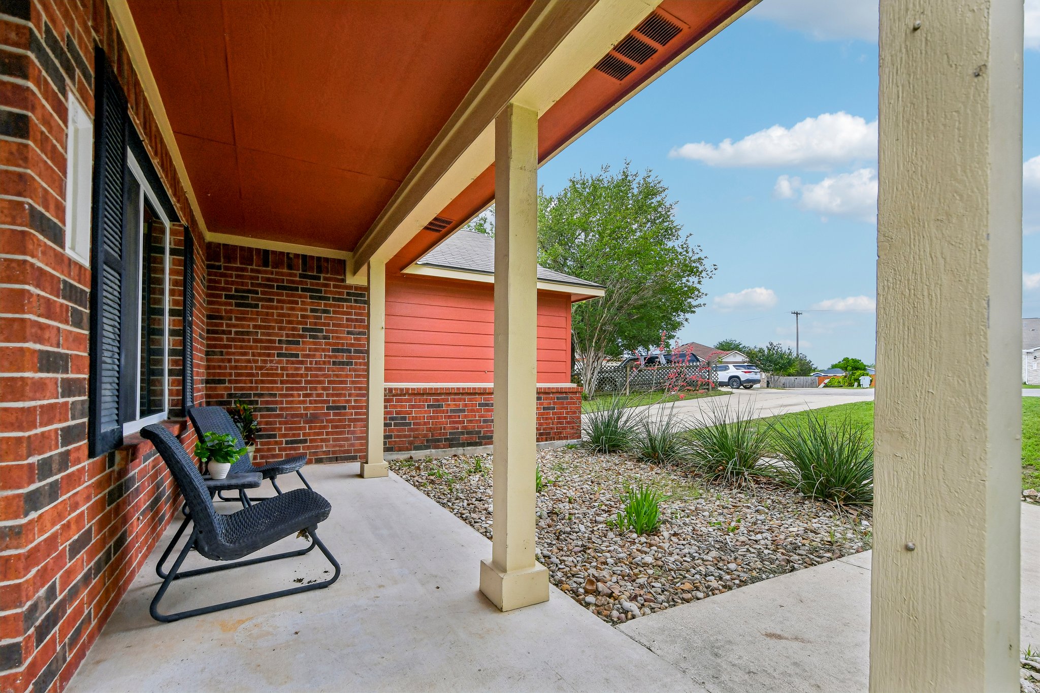 125 Mason Reed Cove Kyle, TX 78640 - Photo 5 of 39 a view of backyard with seating space
