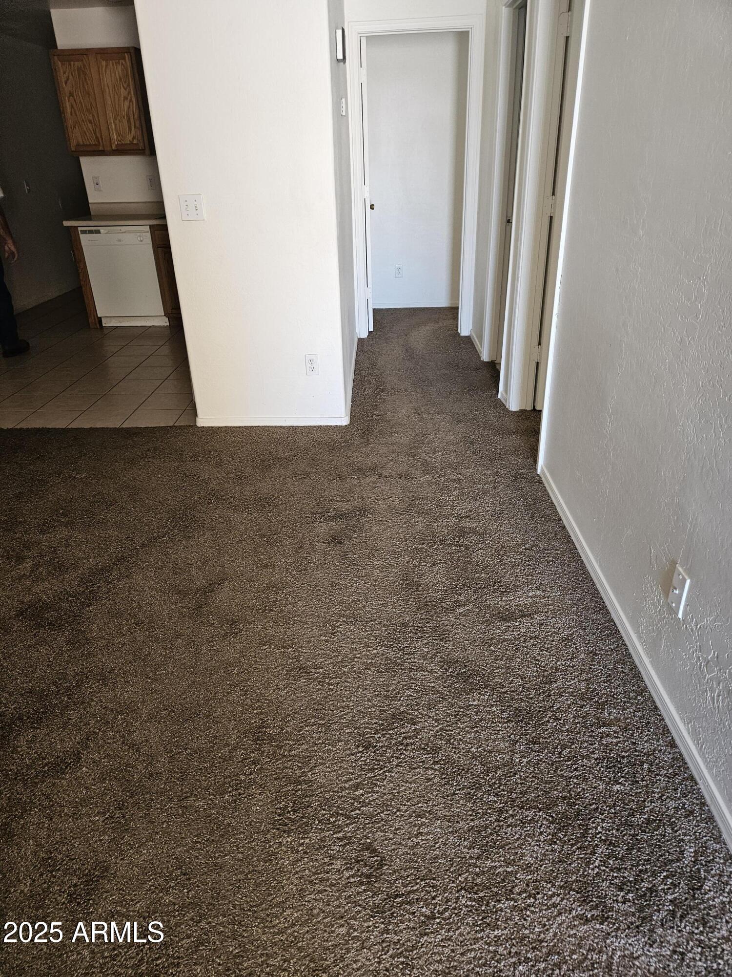 15676 South Moon Valley Road, Unit 2 Arizona City, AZ 85123 - Photo 2 of 5 a view of a house with a hallway
