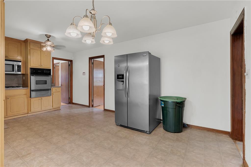 1620 Rock Cut Road Conley, GA 30288 - Photo 11 of 43 a view of an empty room with a kitchen