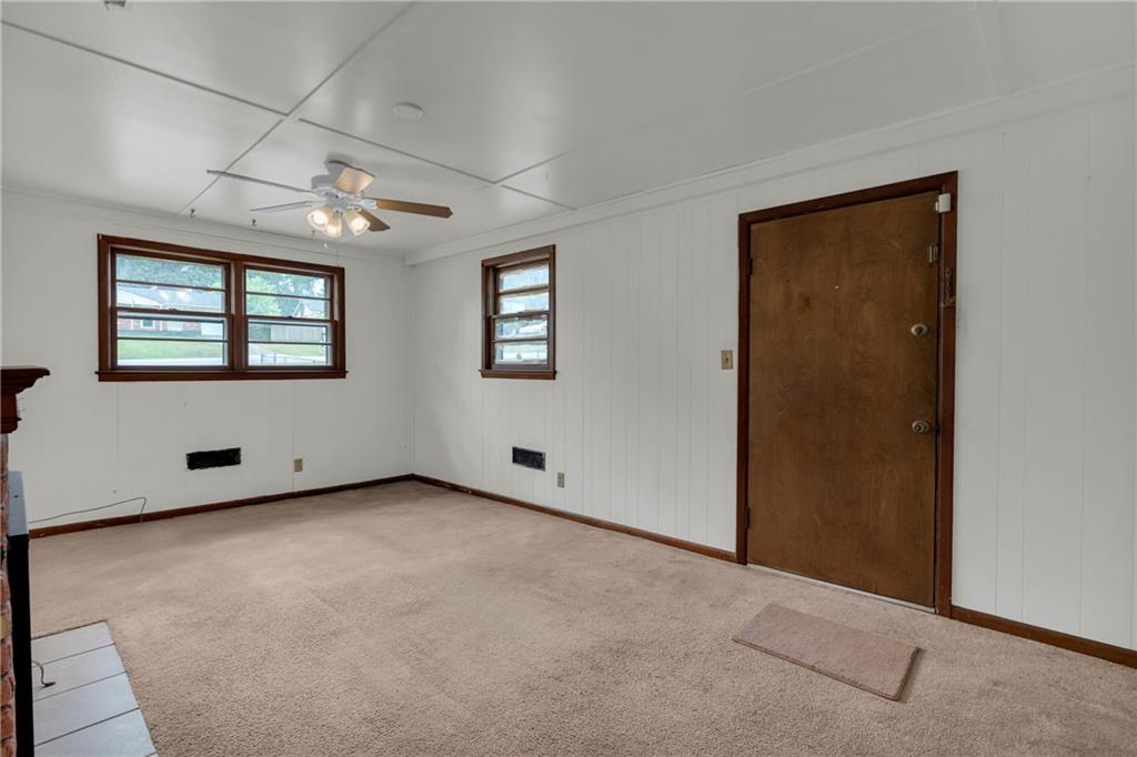 1620 Rock Cut Road Conley, GA 30288 - Photo 15 of 43 an empty room with windows
