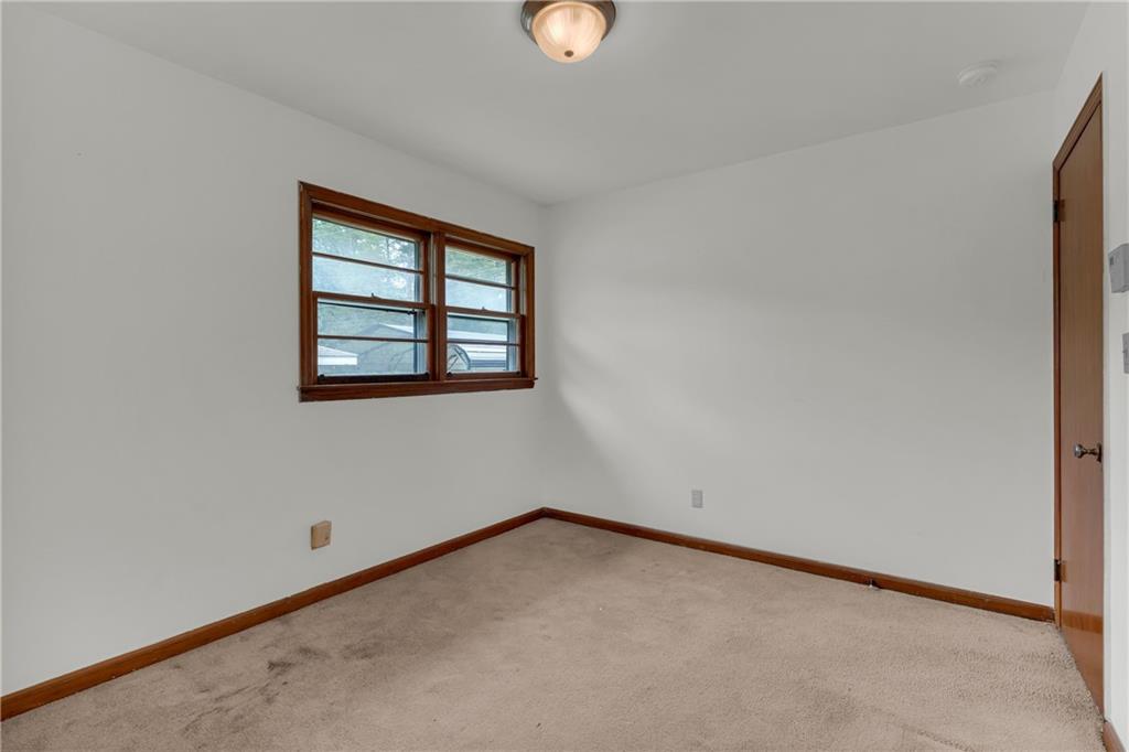 1620 Rock Cut Road Conley, GA 30288 - Photo 25 of 43 an empty room with a window