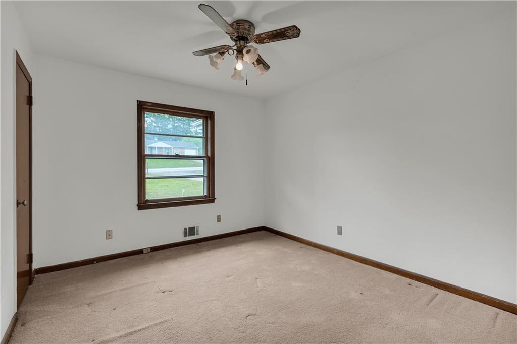 1620 Rock Cut Road Conley, GA 30288 - Photo 26 of 43 an empty room with a window