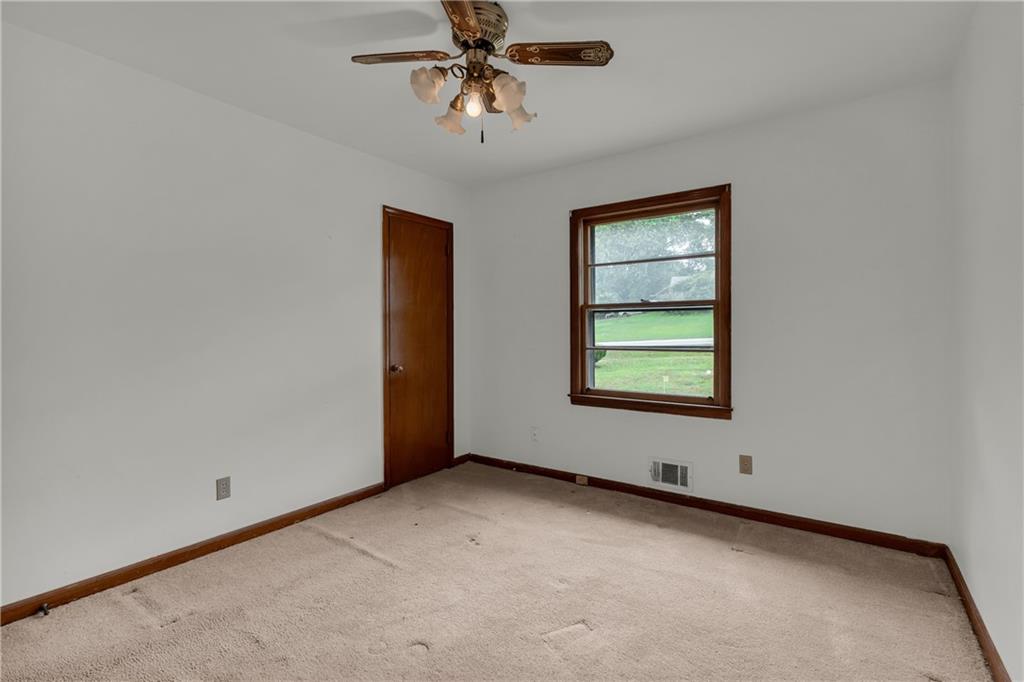 1620 Rock Cut Road Conley, GA 30288 - Photo 27 of 43 a view of an empty room with a window