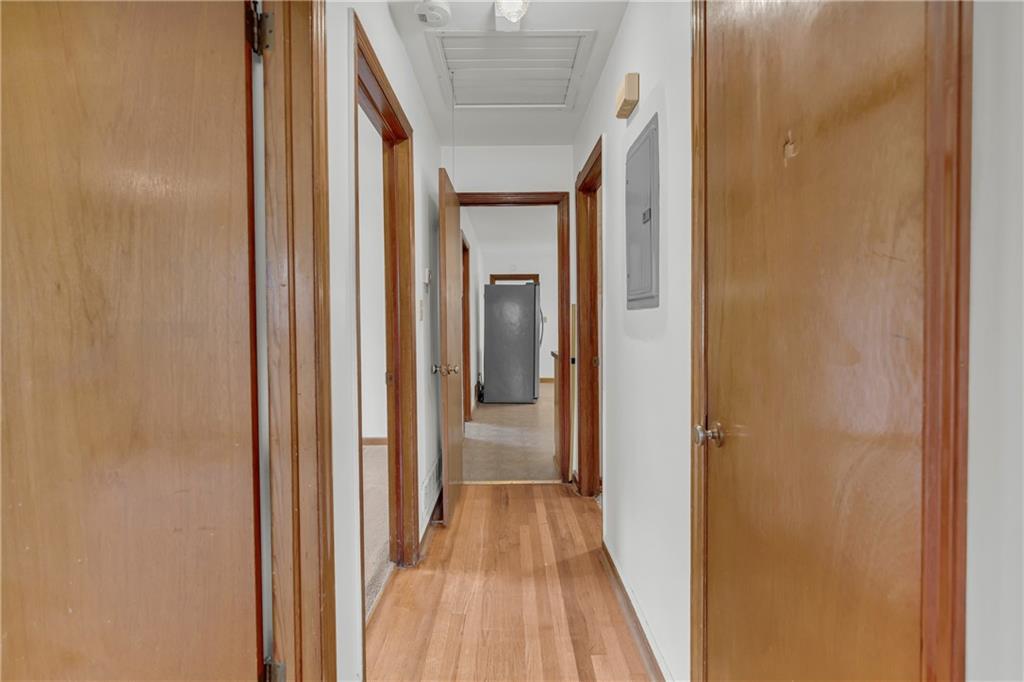 1620 Rock Cut Road Conley, GA 30288 - Photo 28 of 43 a view of a hallway with wooden floor