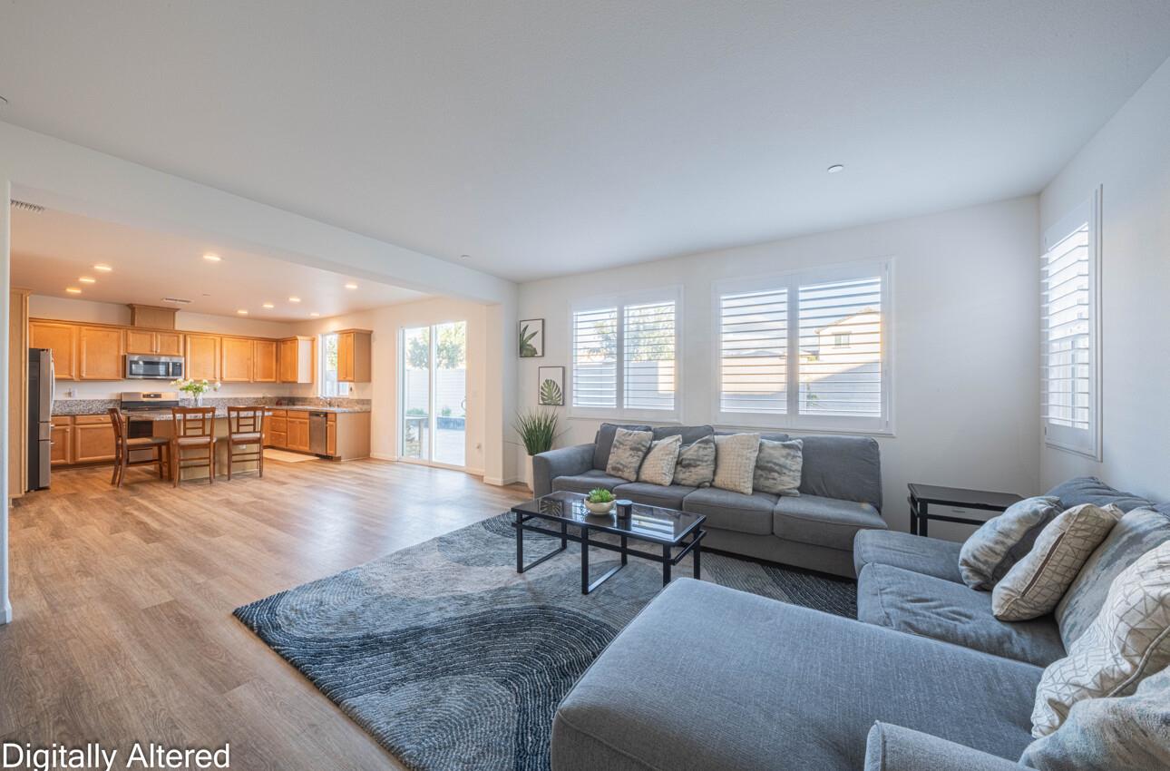 570 Tankersley Street Soledad, CA 93960 - Photo 13 of 64 a living room with furniture and a wooden floor