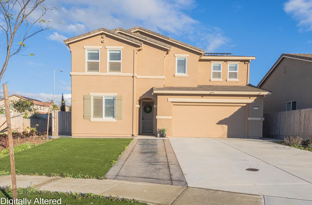 570 Tankersley Street Soledad, CA 93960 - Photo 2 of 64 a front view of a house with a yard