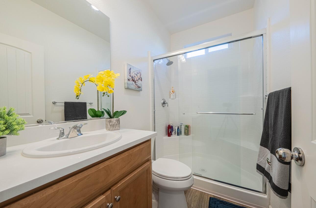 570 Tankersley Street Soledad, CA 93960 - Photo 33 of 64 a bathroom with a sink toilet and shower