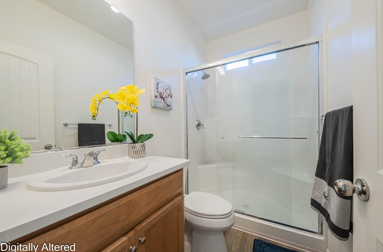 570 Tankersley Street Soledad, CA 93960 - Photo 34 of 64 a bathroom with a sink toilet and shower