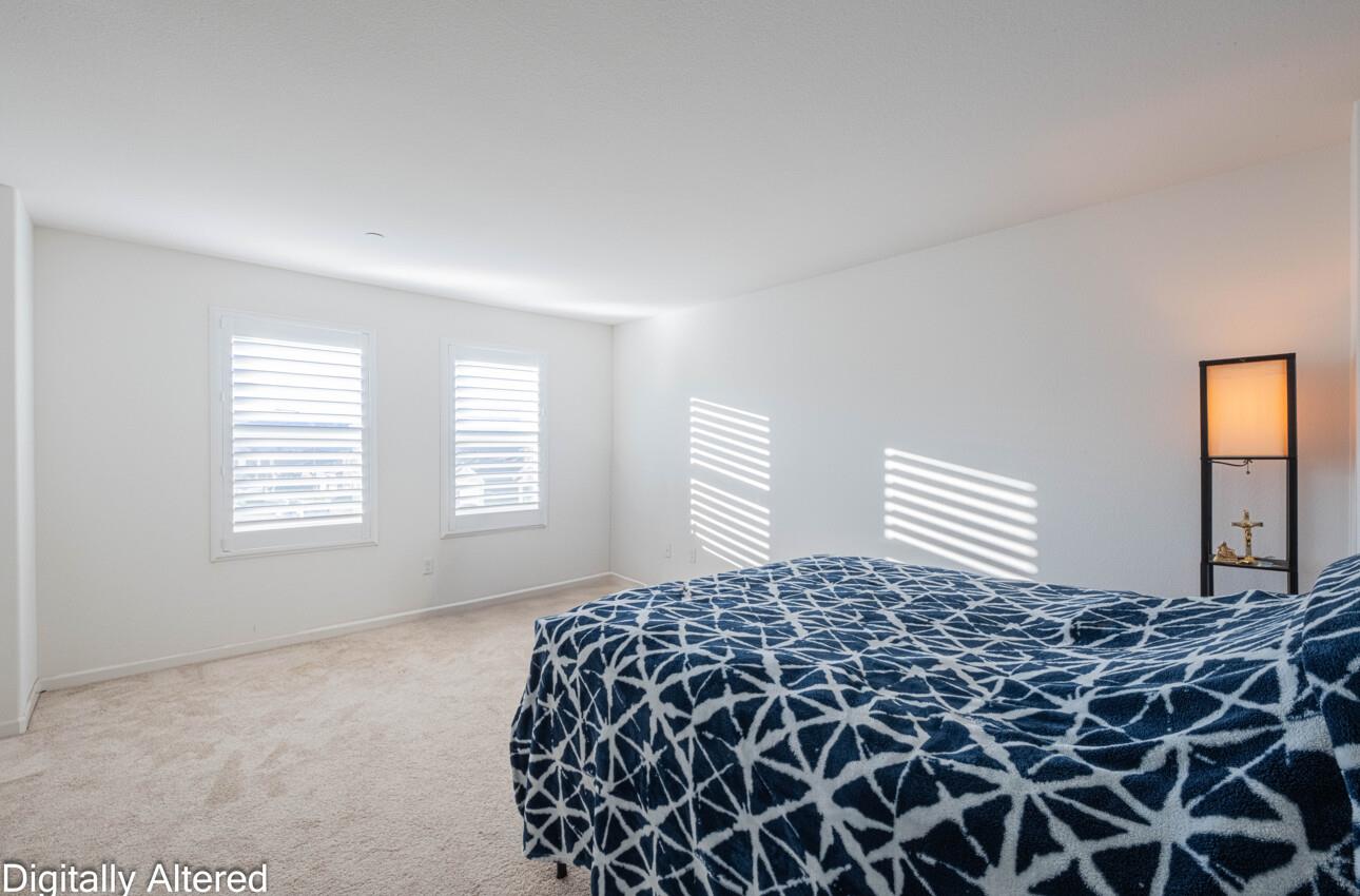 570 Tankersley Street Soledad, CA 93960 - Photo 39 of 64 a bedroom with a large bed and a window