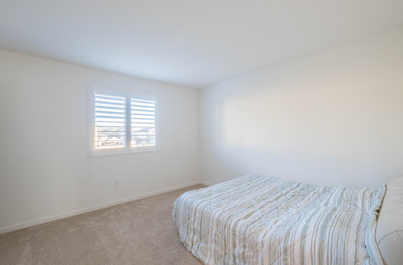 570 Tankersley Street Soledad, CA 93960 - Photo 53 of 64 a bedroom with a bed and a window