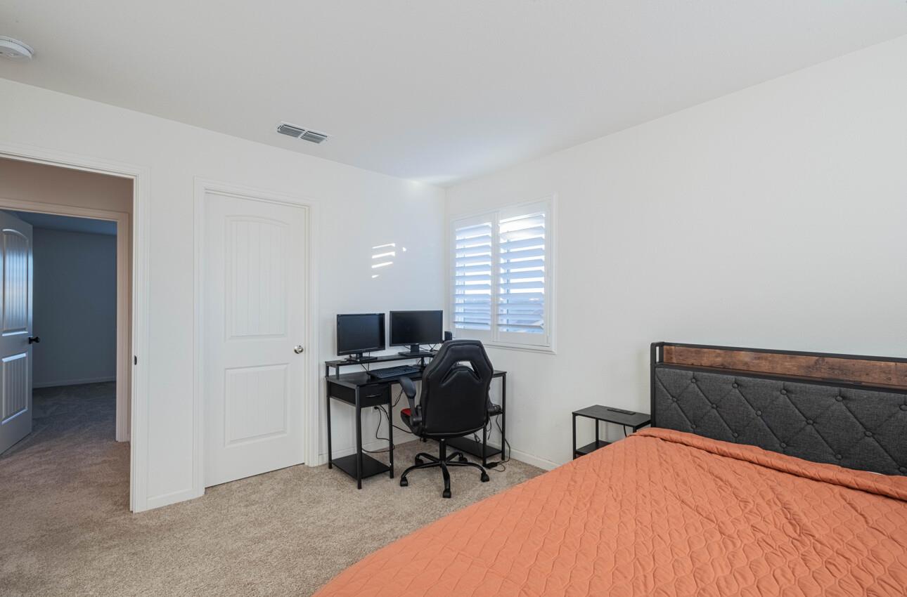 570 Tankersley Street Soledad, CA 93960 - Photo 57 of 64 a bedroom with a workspace